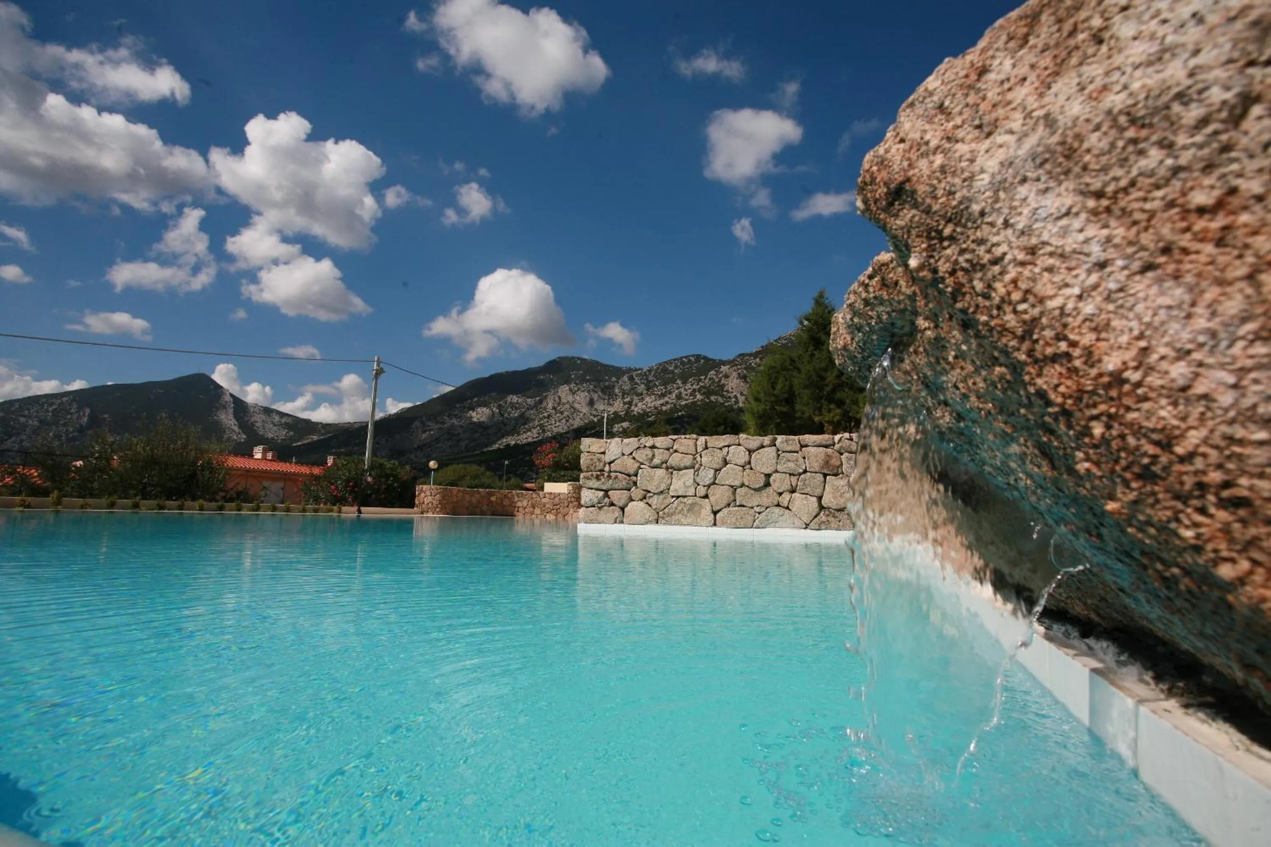 Swimming pool in Hotel Villa Gustui Maris