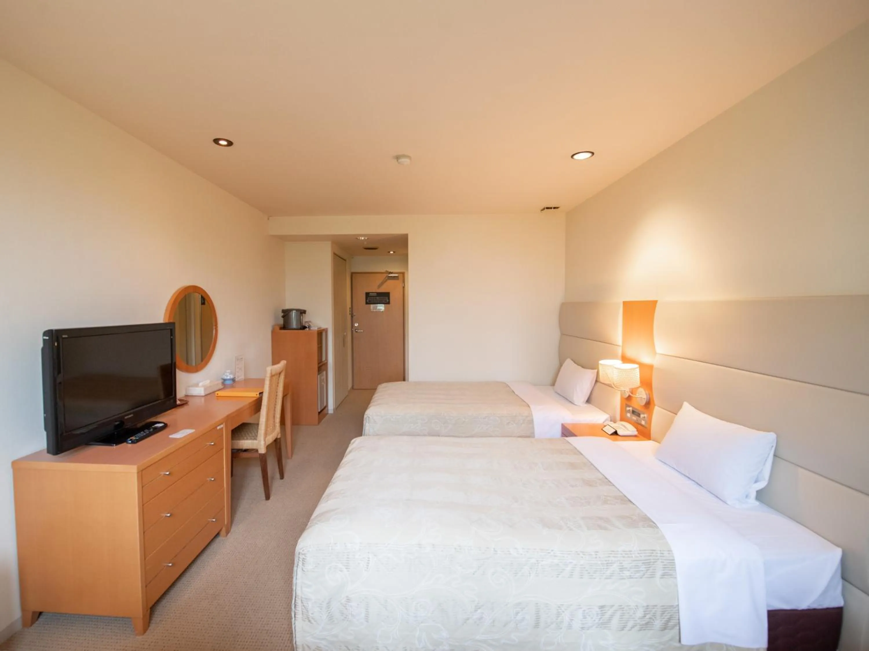 Bed in Tabist Hotel Colosseum Inn Tateshina