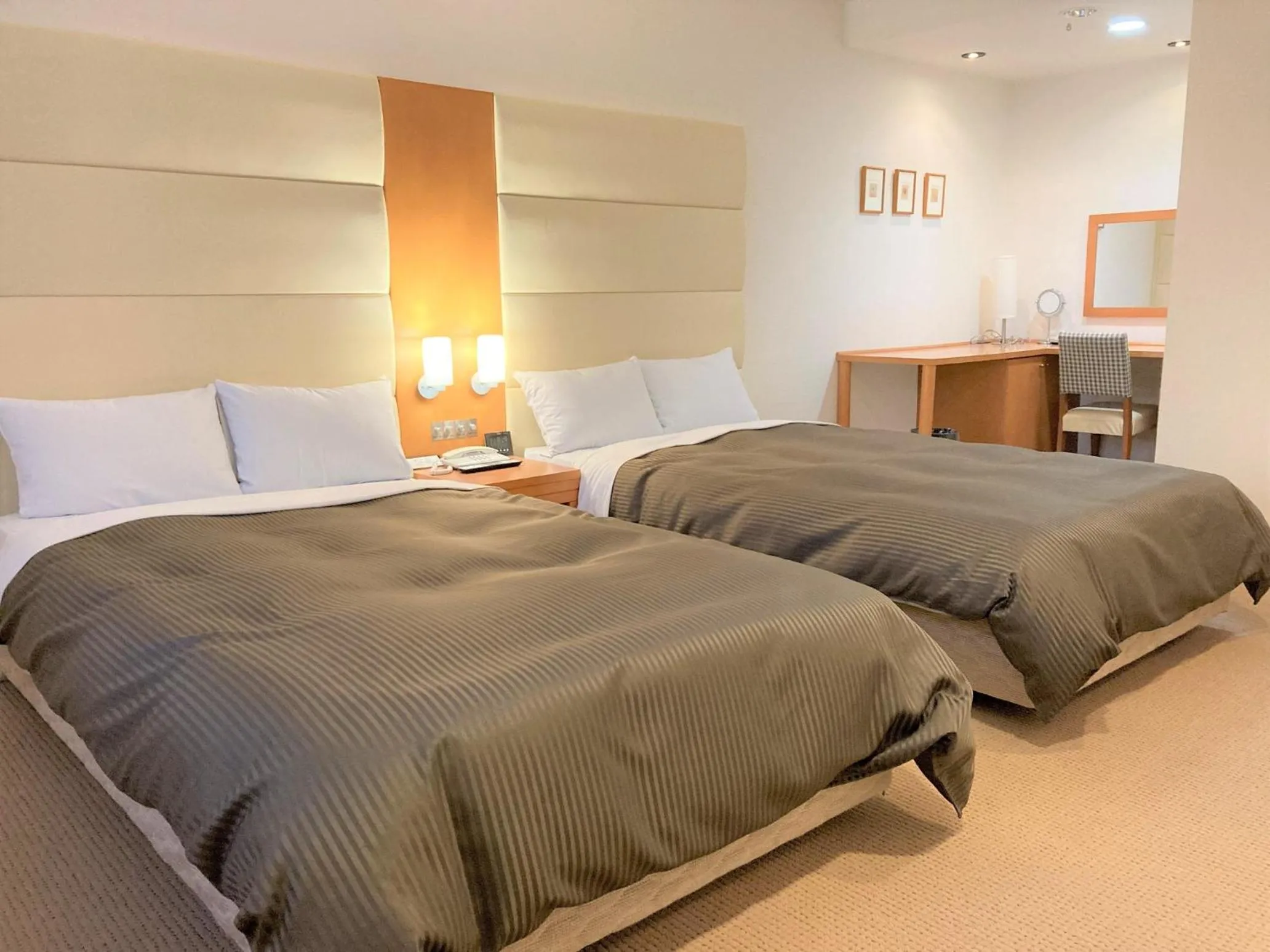 Bed in Tabist Hotel Colosseum Inn Tateshina