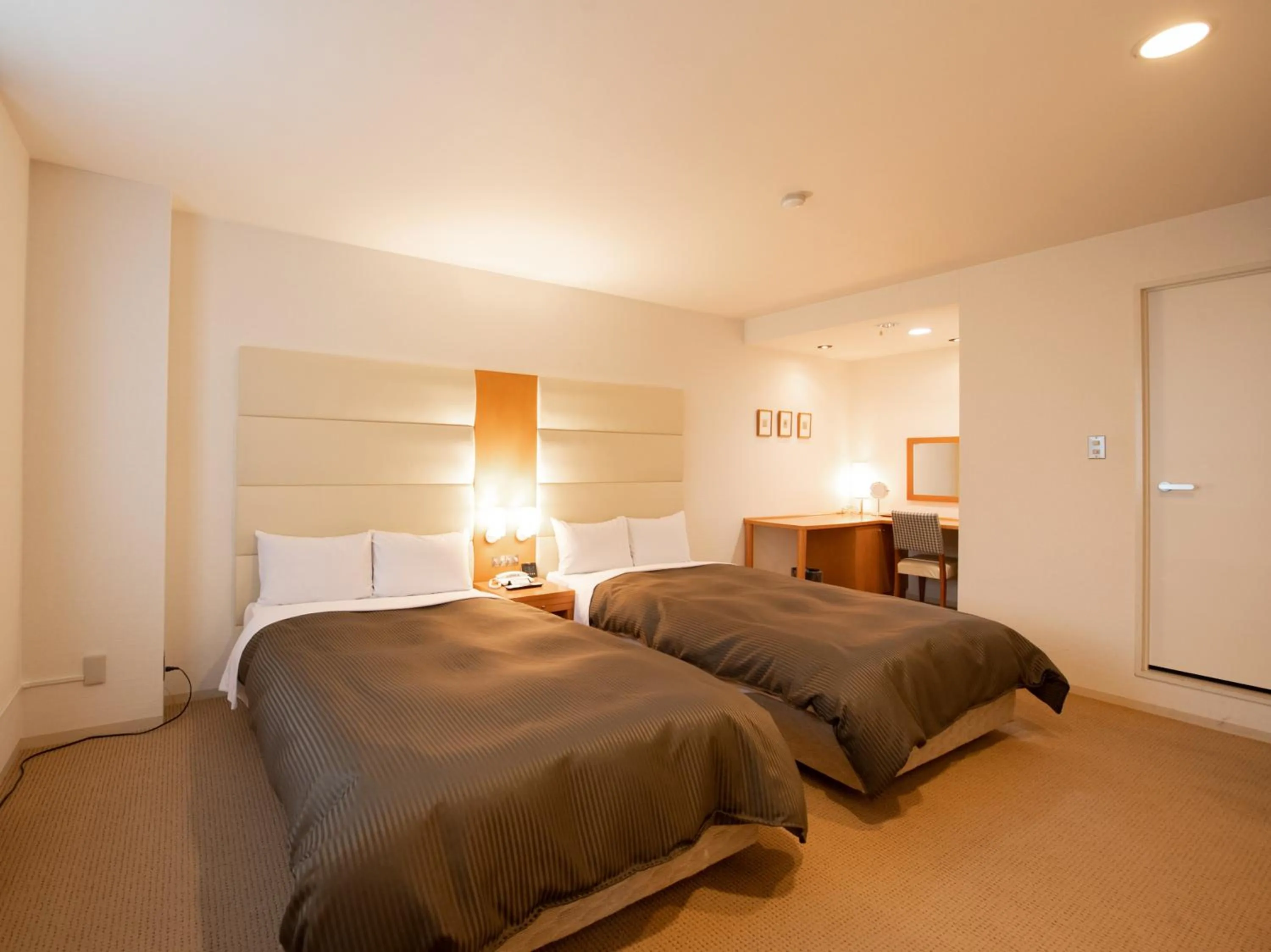 Bed in Tabist Hotel Colosseum Inn Tateshina