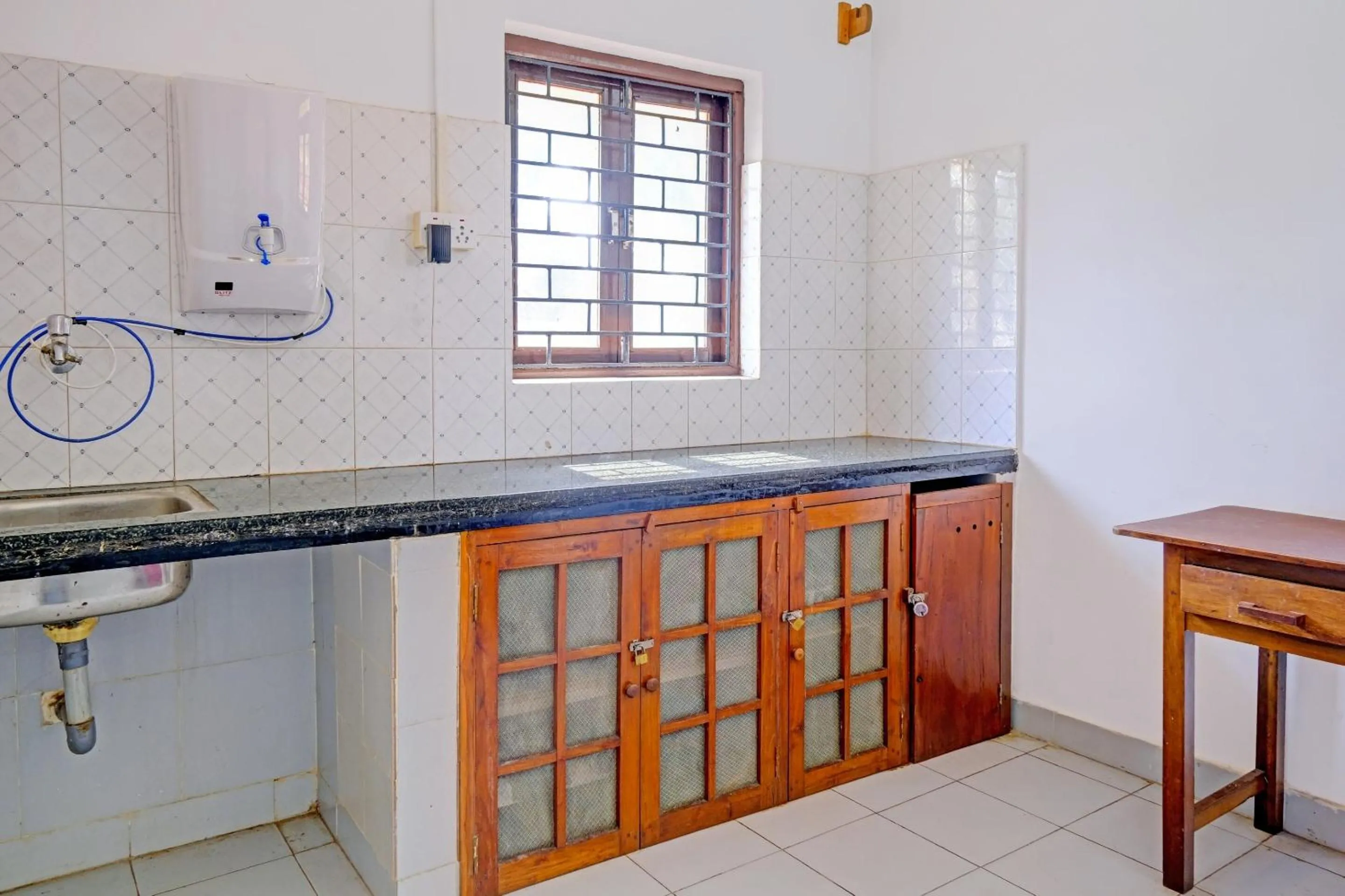 Kitchen or kitchenette in Hotel O Cathsil Cottages