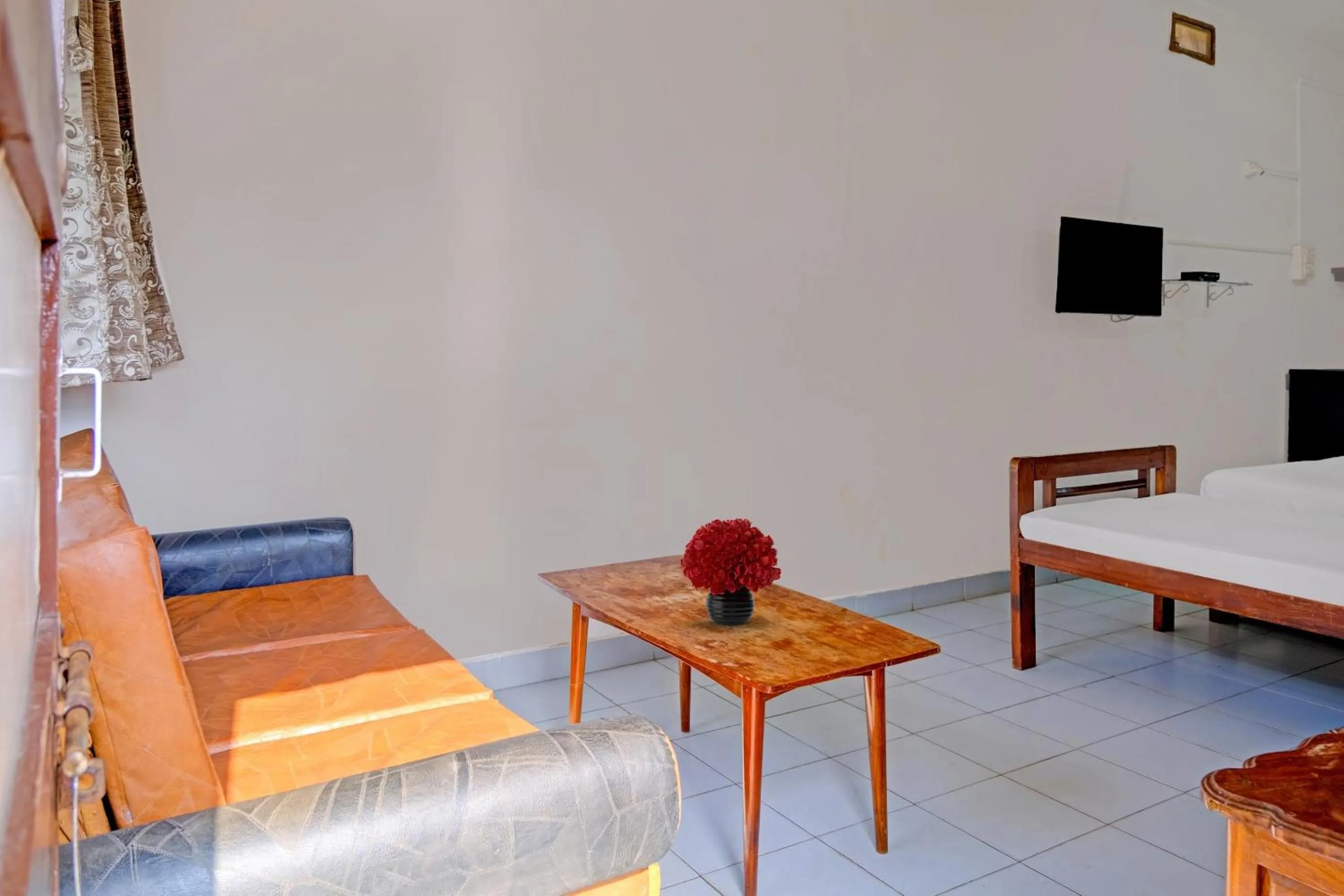 Bedroom in Hotel O Cathsil Cottages