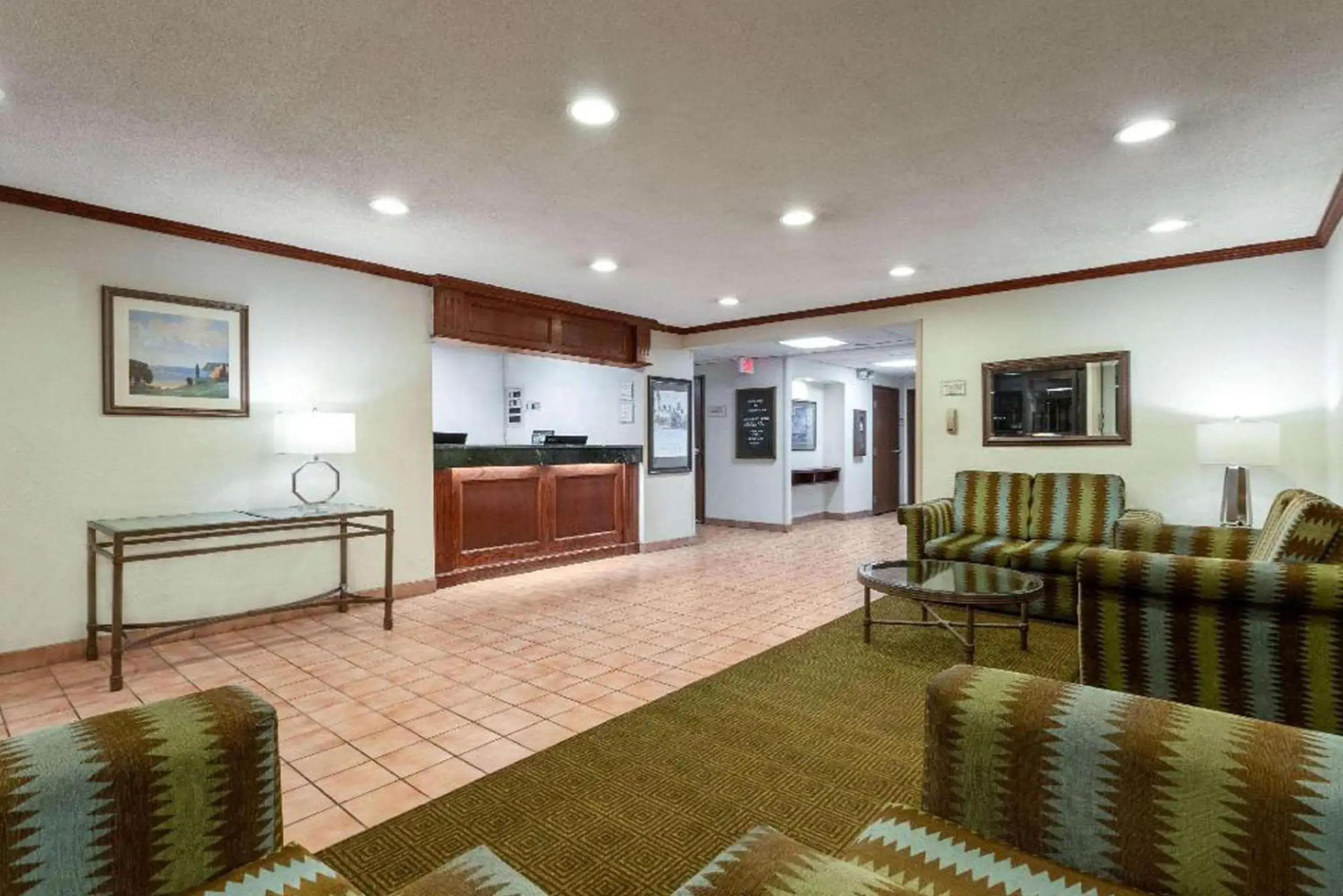 Seating area, Lobby/Reception in Norwood Inn & Suites Indianapolis East Post Drive