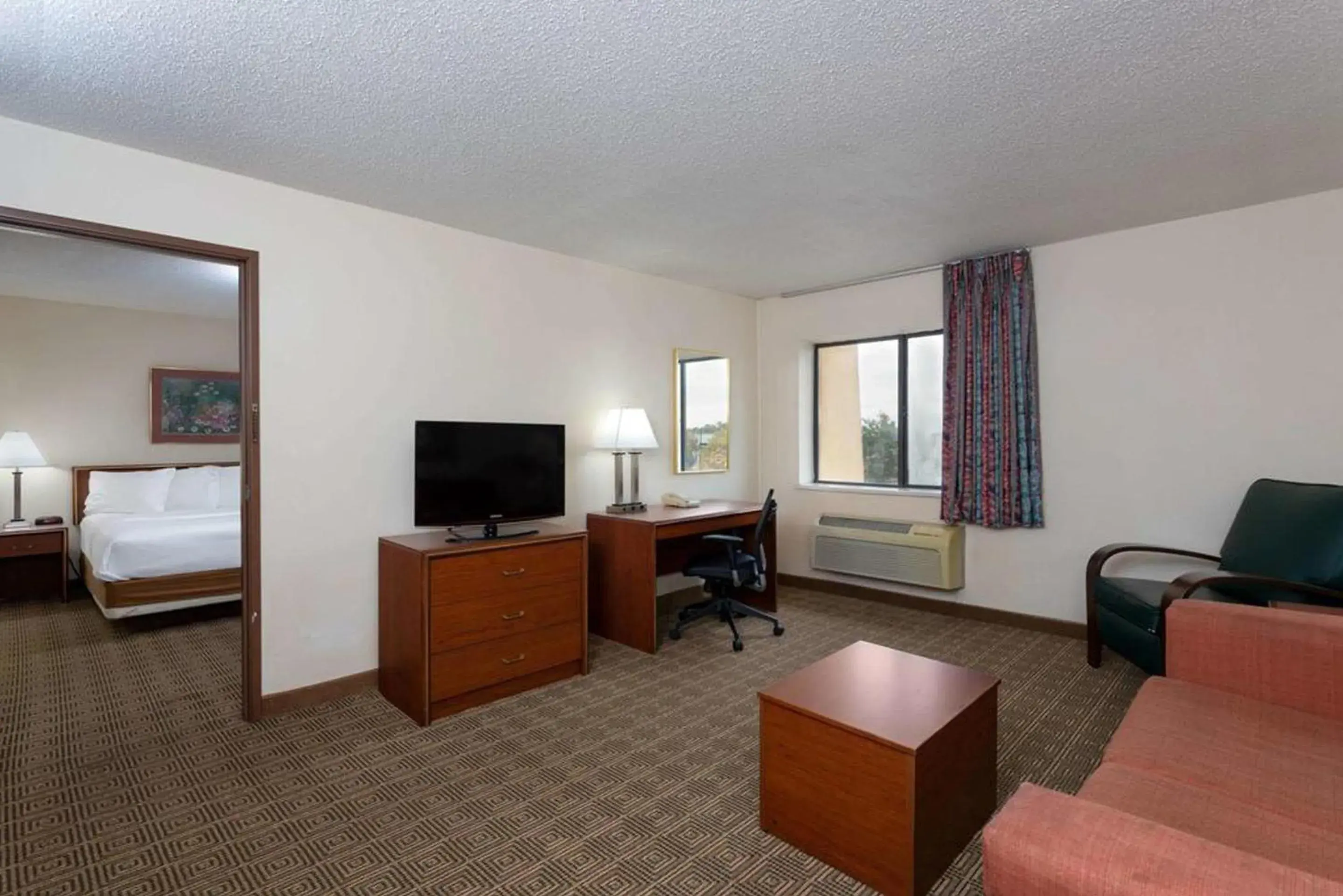 Living room, TV/Entertainment Center in Norwood Inn & Suites Indianapolis East Post Drive