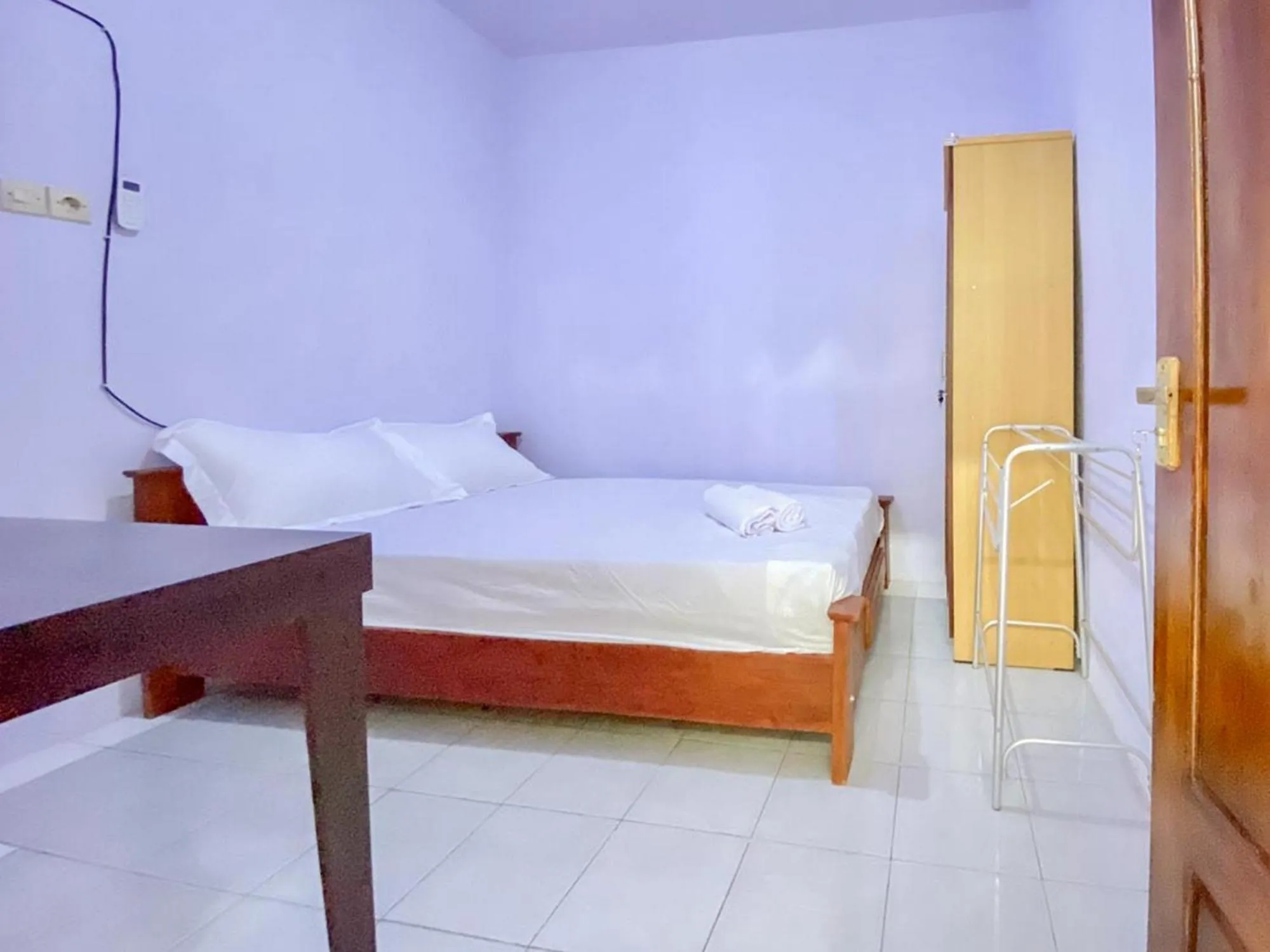 Bed in Griya Asri Syariah Mitra RedDoorz