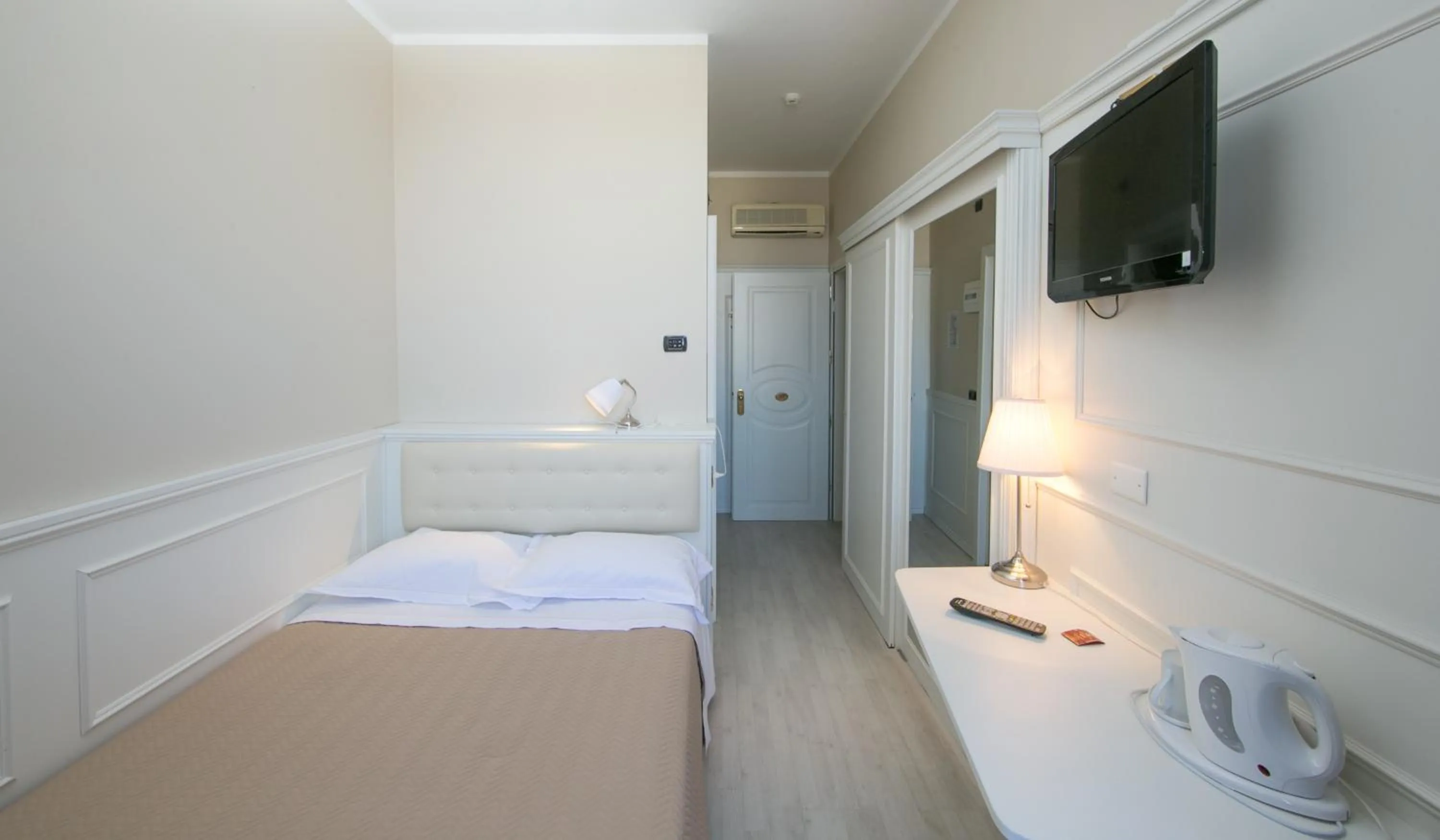 Bed in Hotel Ariston