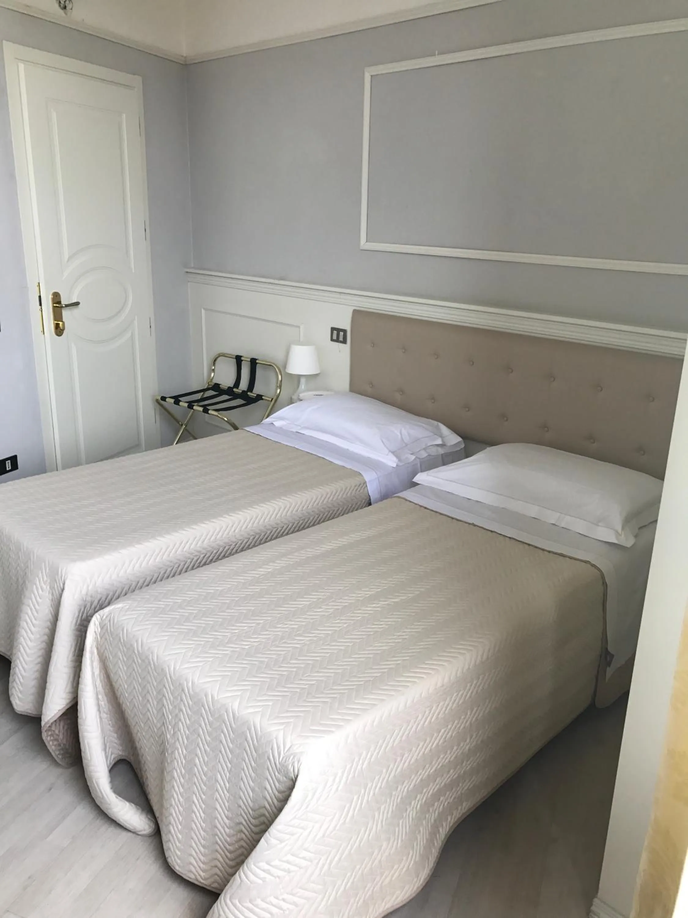 Bed in Hotel Ariston