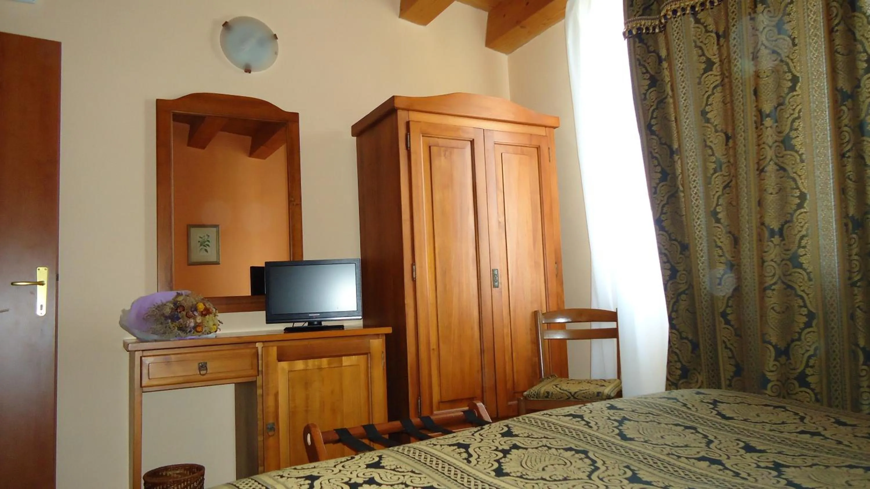 Photo of the whole room, Bed in Hotel Archimede Ortigia