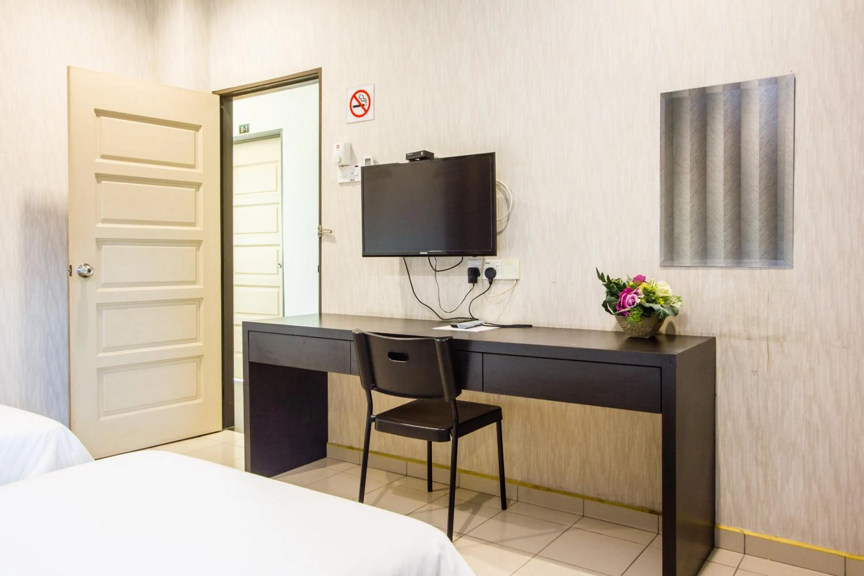 TV and multimedia, Bed in Value Inn Homestay