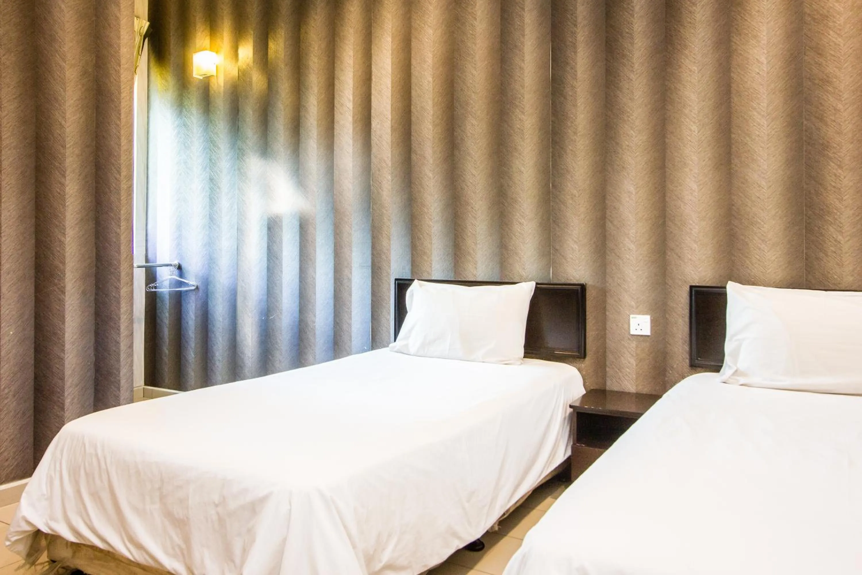 Bed in Value Inn Homestay