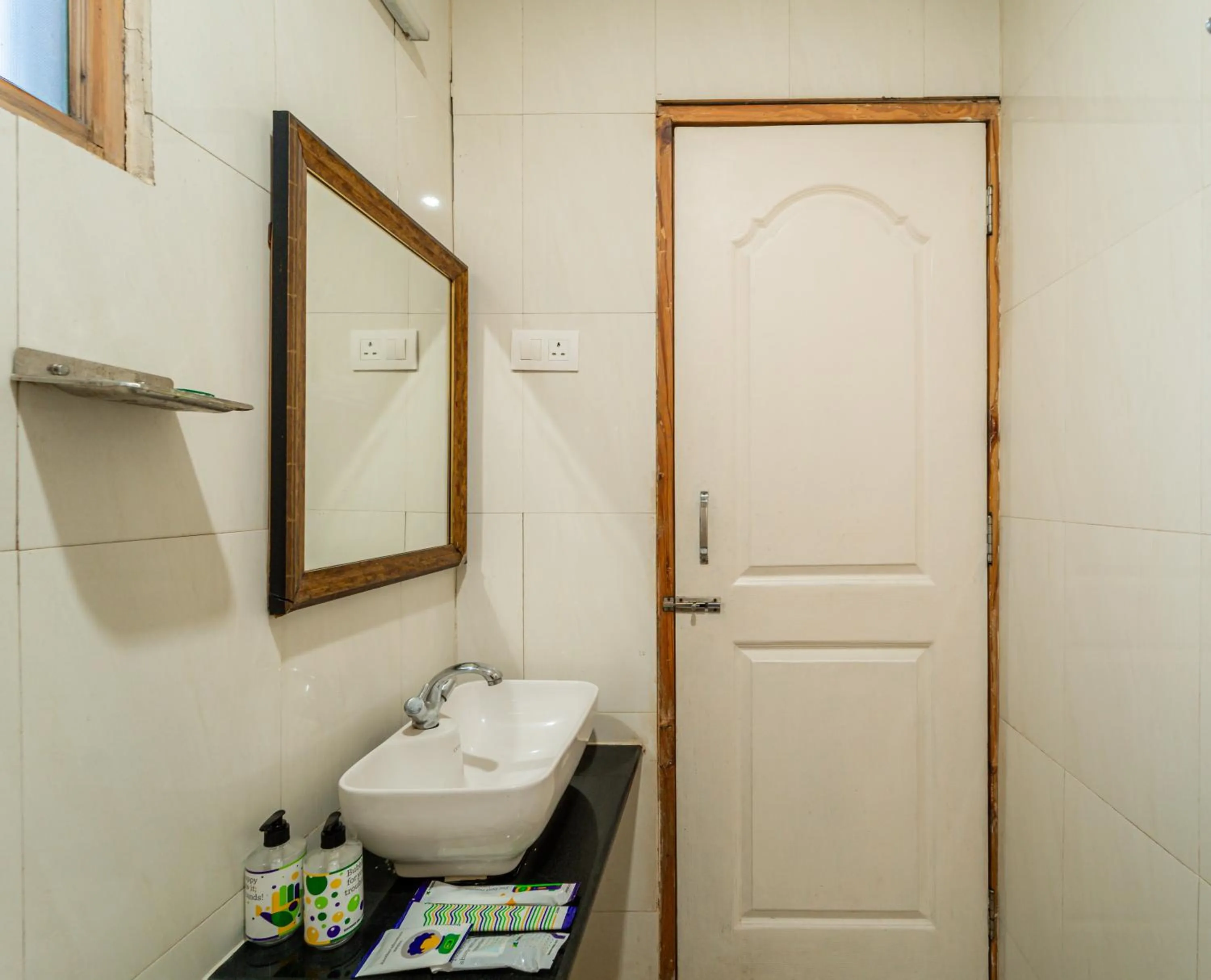 Toilet in Treebo Gulmohar Beach Resort with Pool