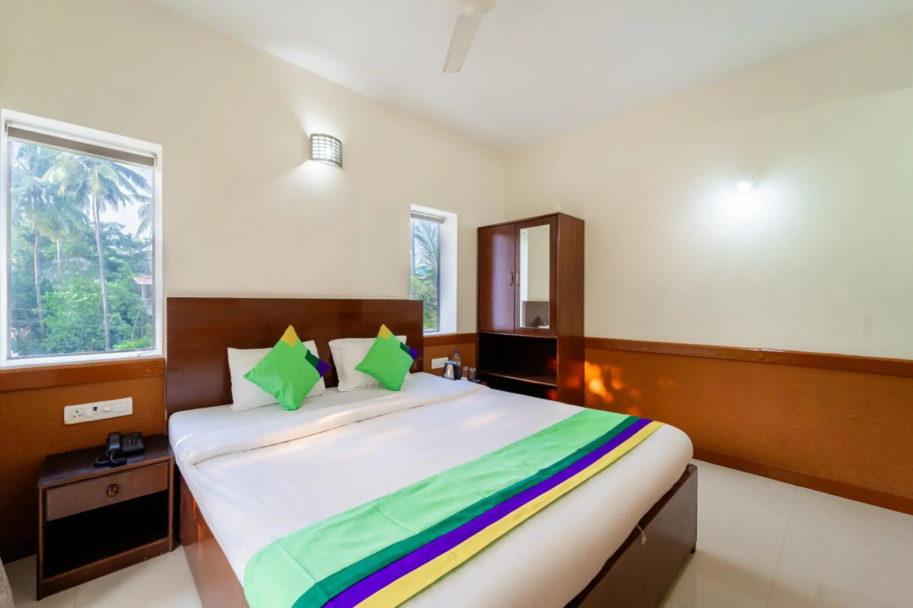 Bedroom, Bed in Treebo Gulmohar Beach Resort with Pool Bedroom, Bed in Treebo Gulmohar Beach Resort with Pool