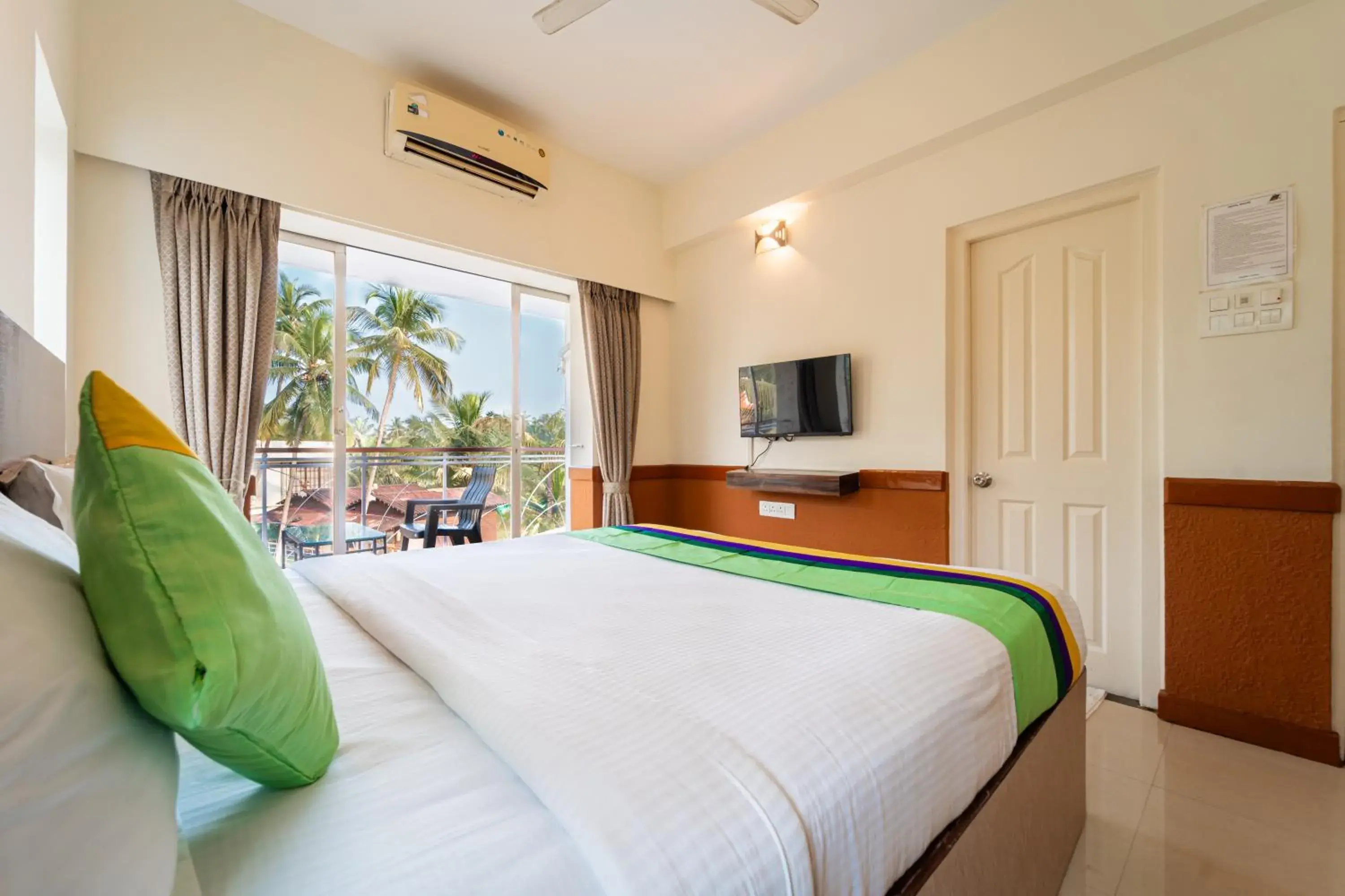 Bedroom, Bed in Treebo Gulmohar Beach Resort with Pool Bedroom, Bed in Treebo Gulmohar Beach Resort with Pool