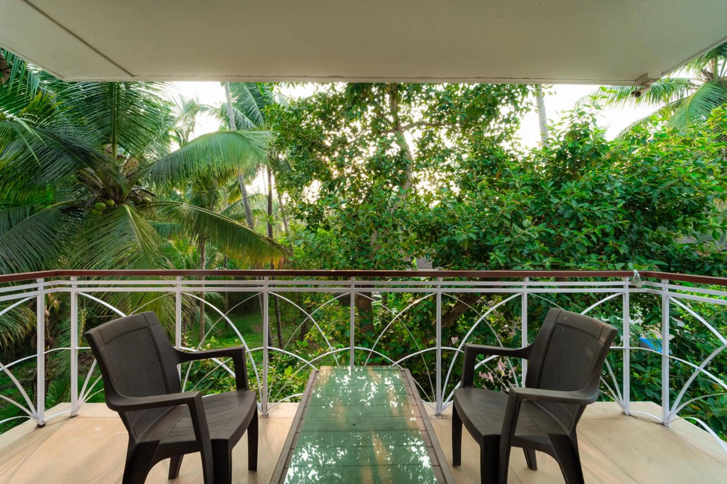 Balcony/Terrace in Treebo Gulmohar Beach Resort with Pool