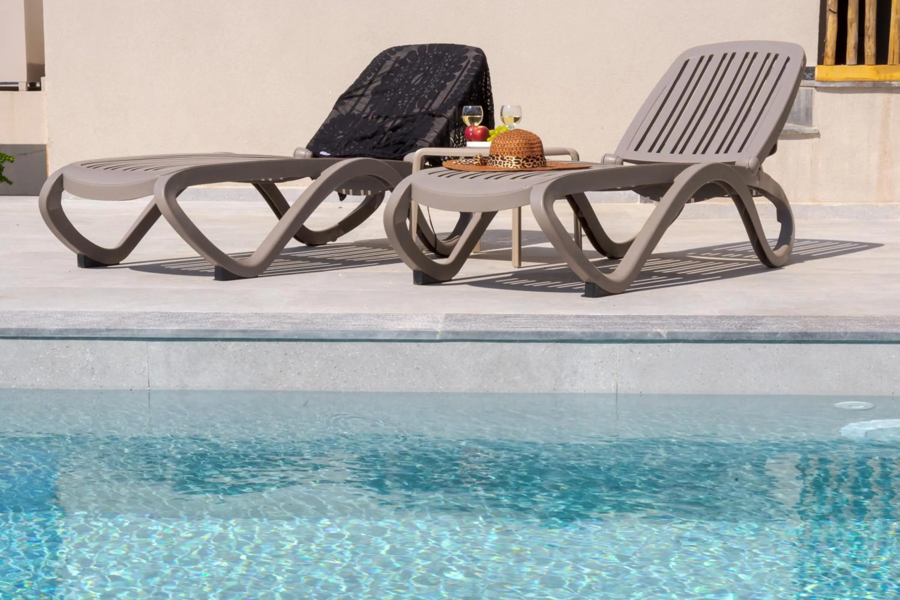 Swimming pool in Casa D'Oro Suites by Estia 'Adults Only'