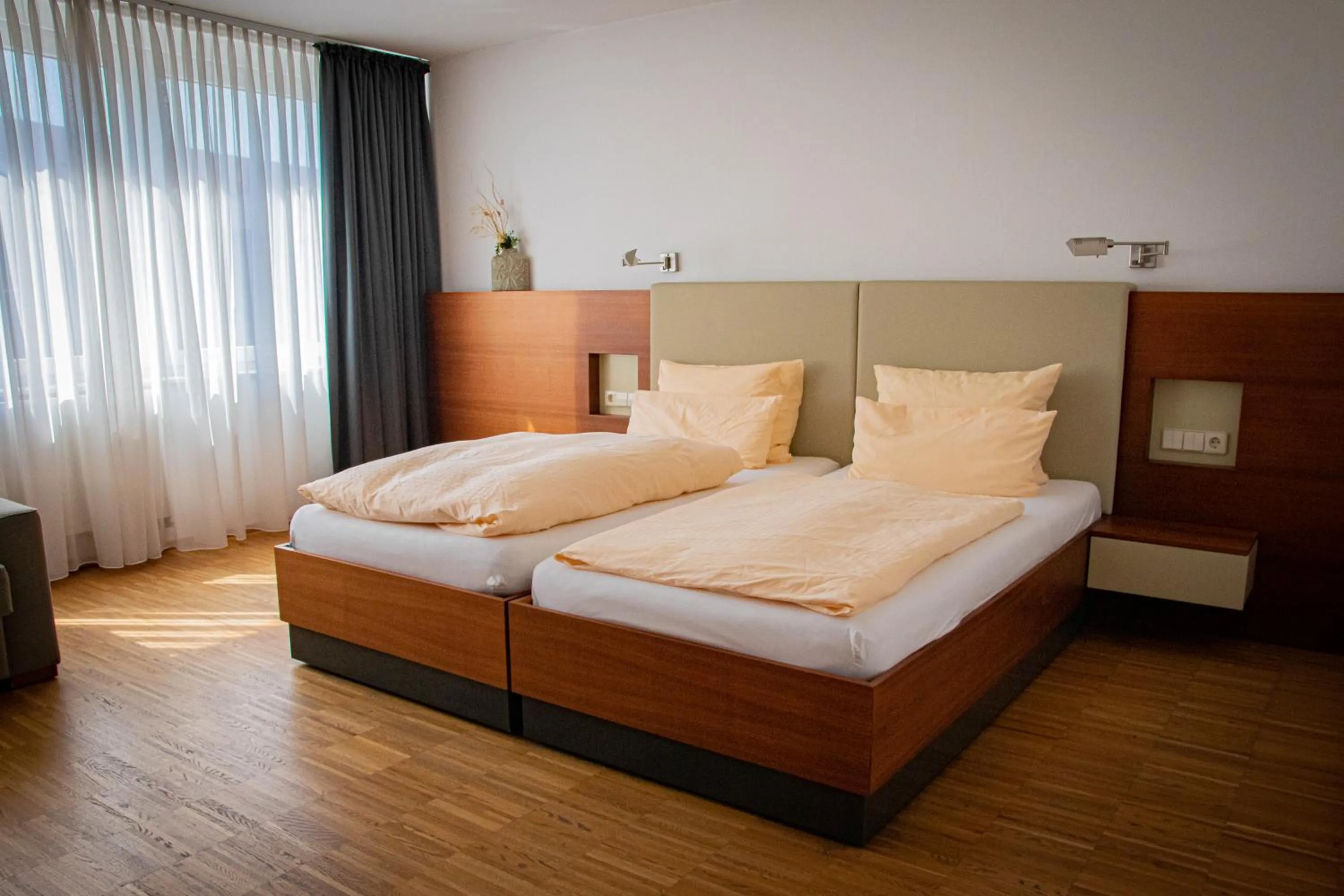 Bed in Gästehaus an der Oase