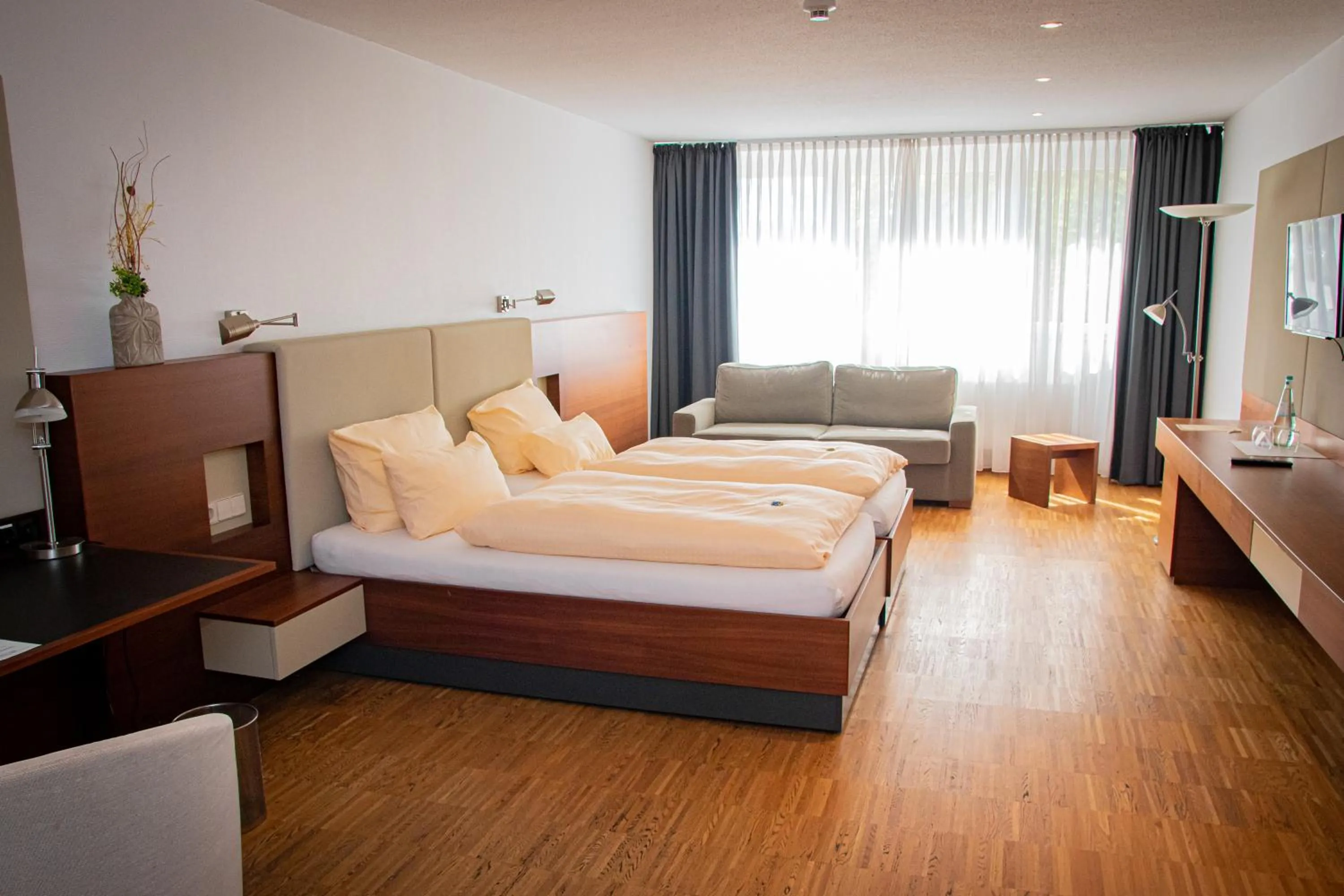 Bed in Gästehaus an der Oase