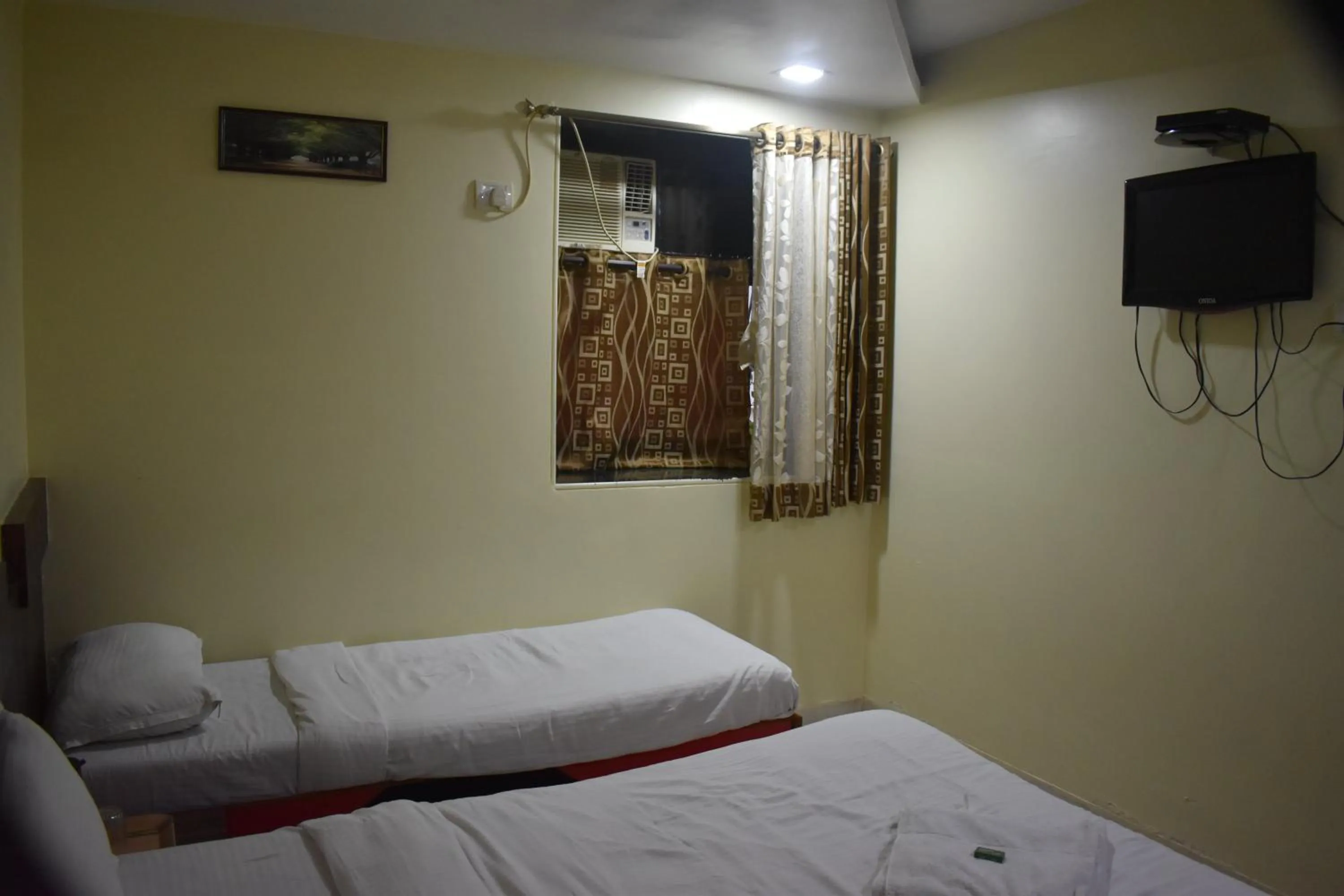 Photo of the whole room, Bed in Hotel Sea View - Near Taj Hotel