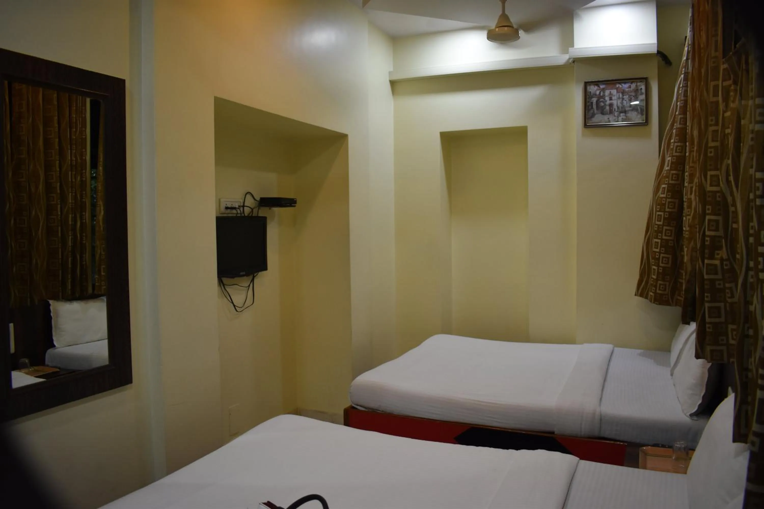 Photo of the whole room, Bed in Hotel Sea View - Near Taj Hotel