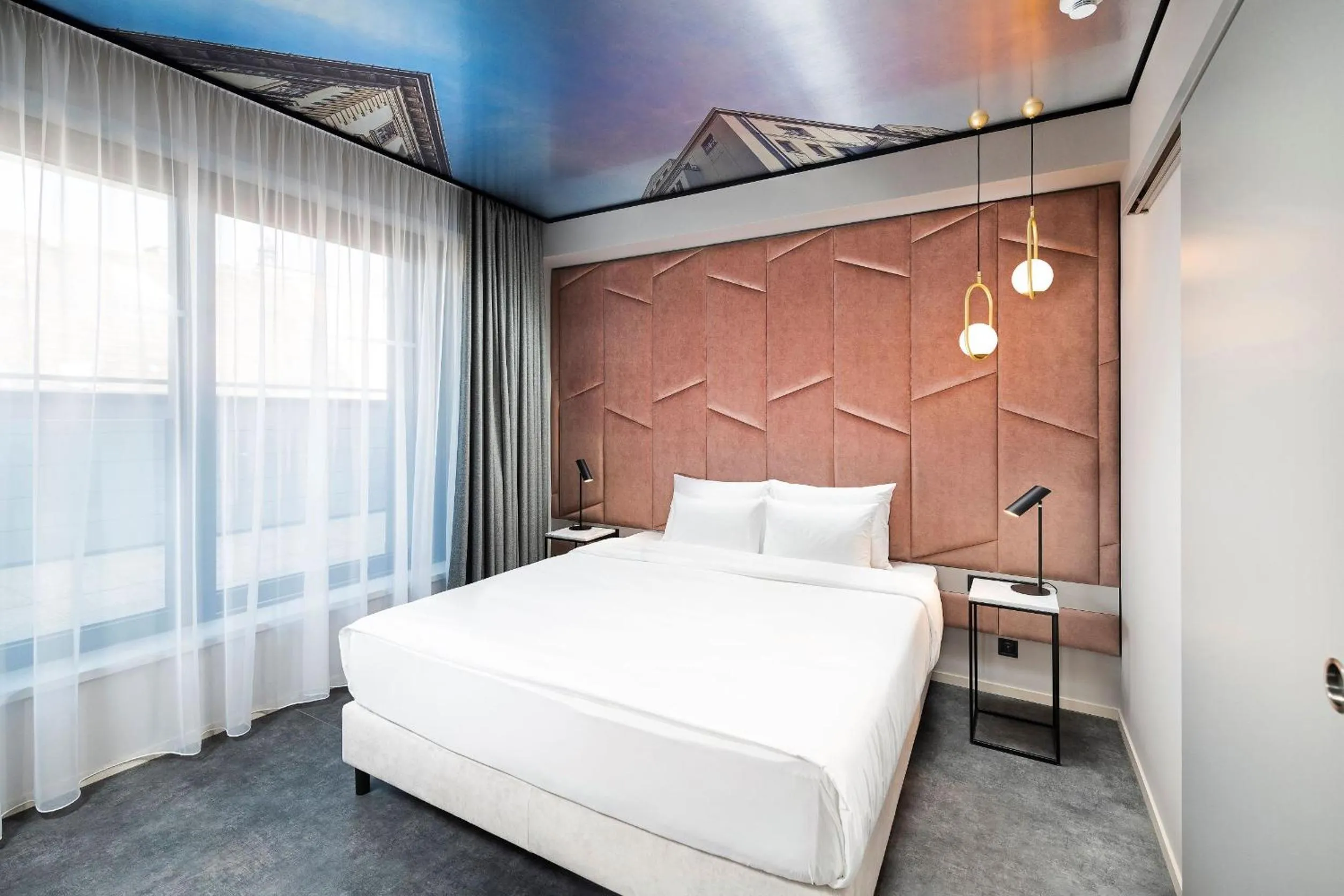 Bed in Three Corners Downtown Hotel