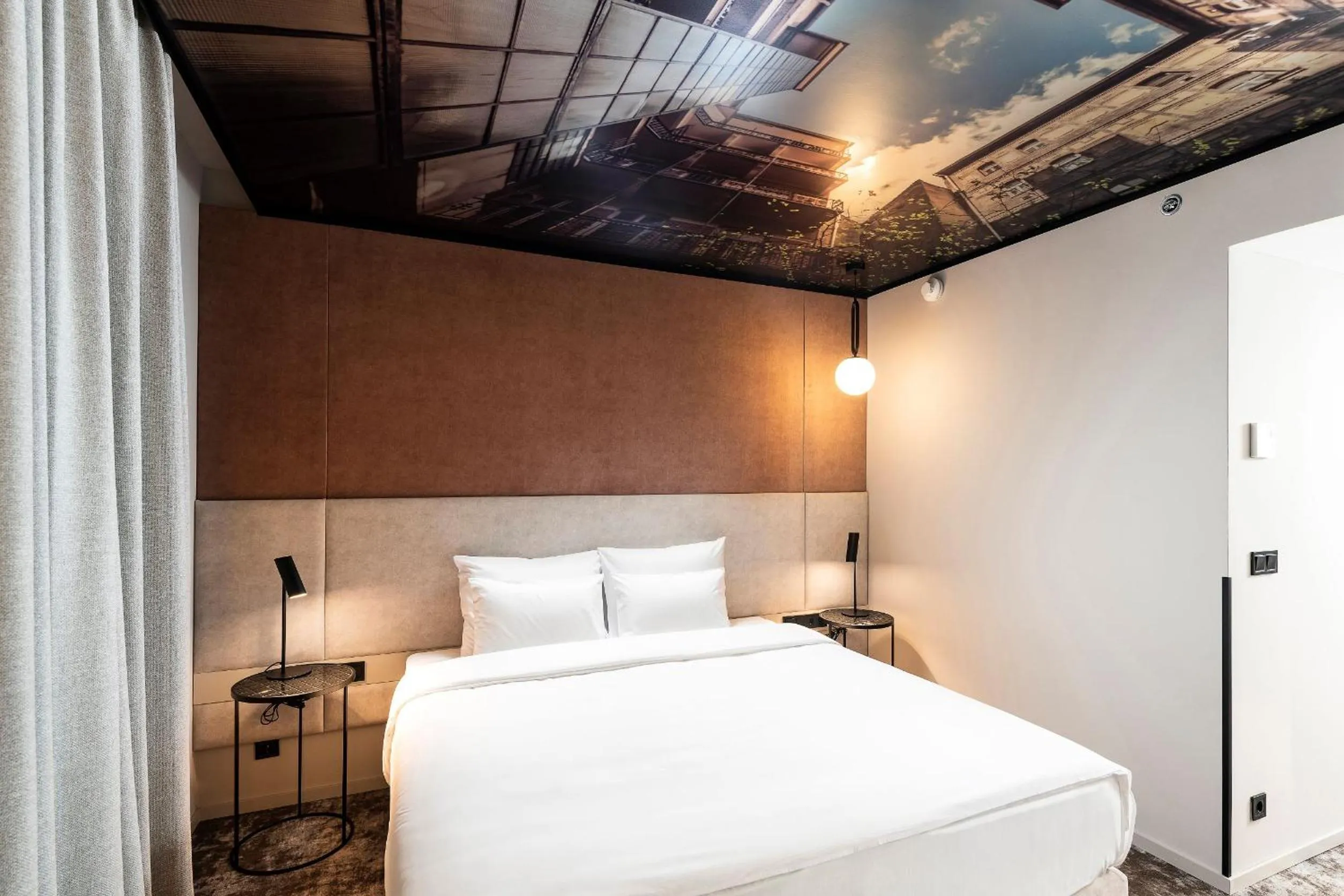 Bed in Three Corners Downtown Hotel