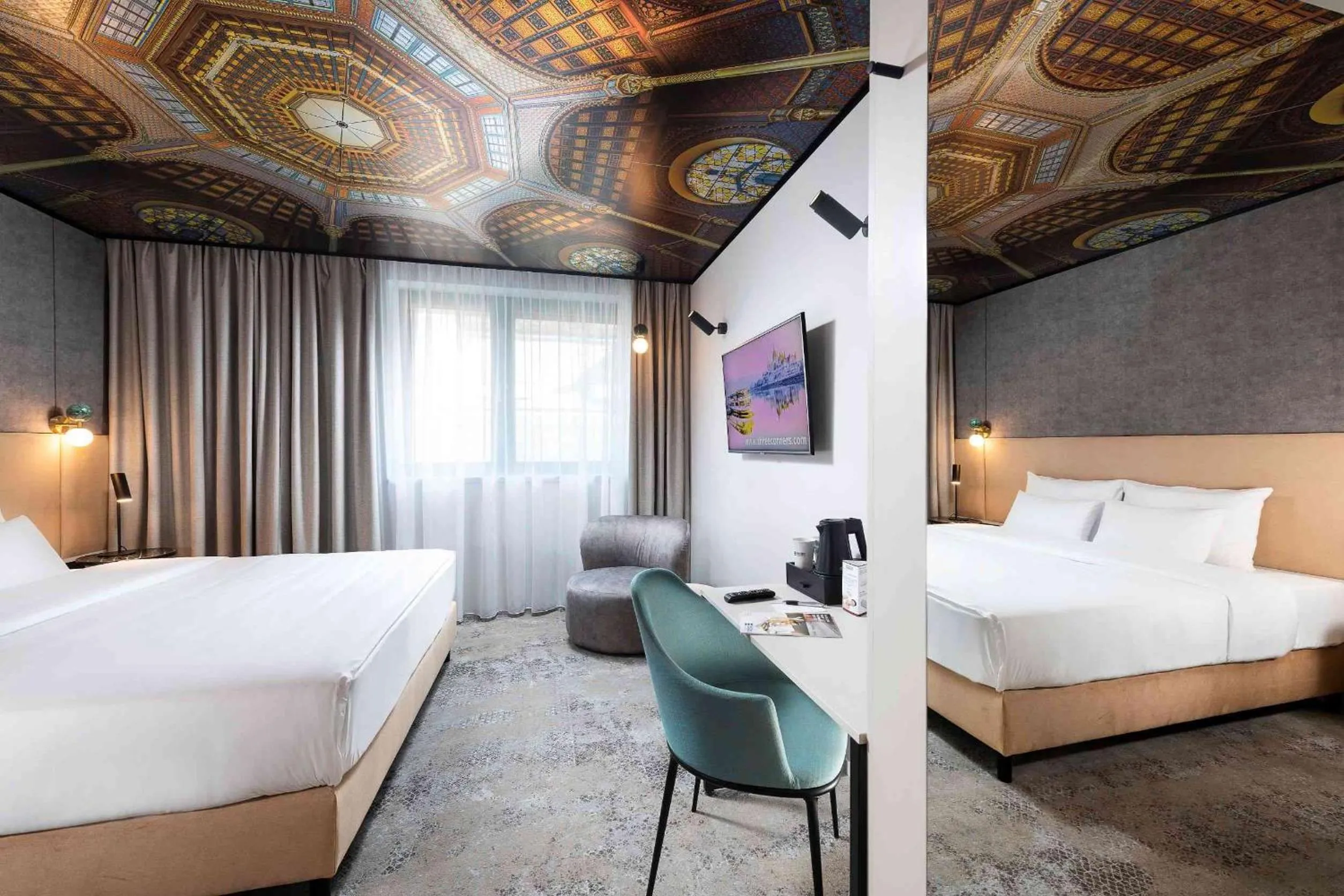 Bed in Three Corners Downtown Hotel