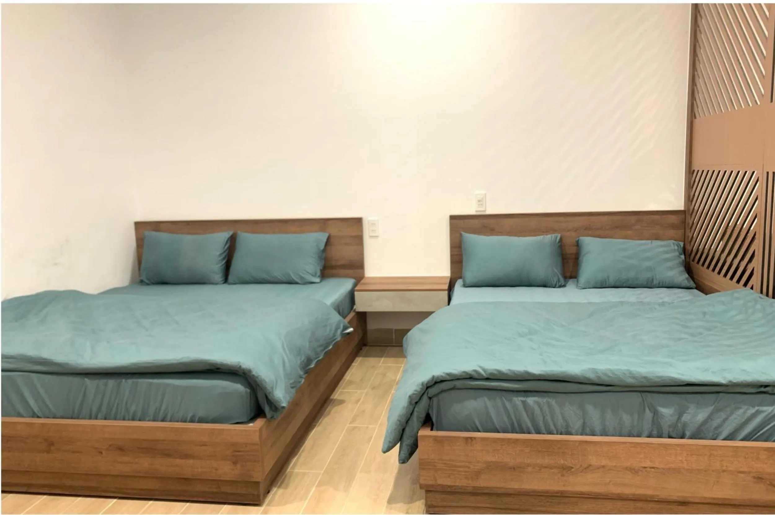 Bedroom, Bed in OYO 1161 Puchin Hotel And Apartment