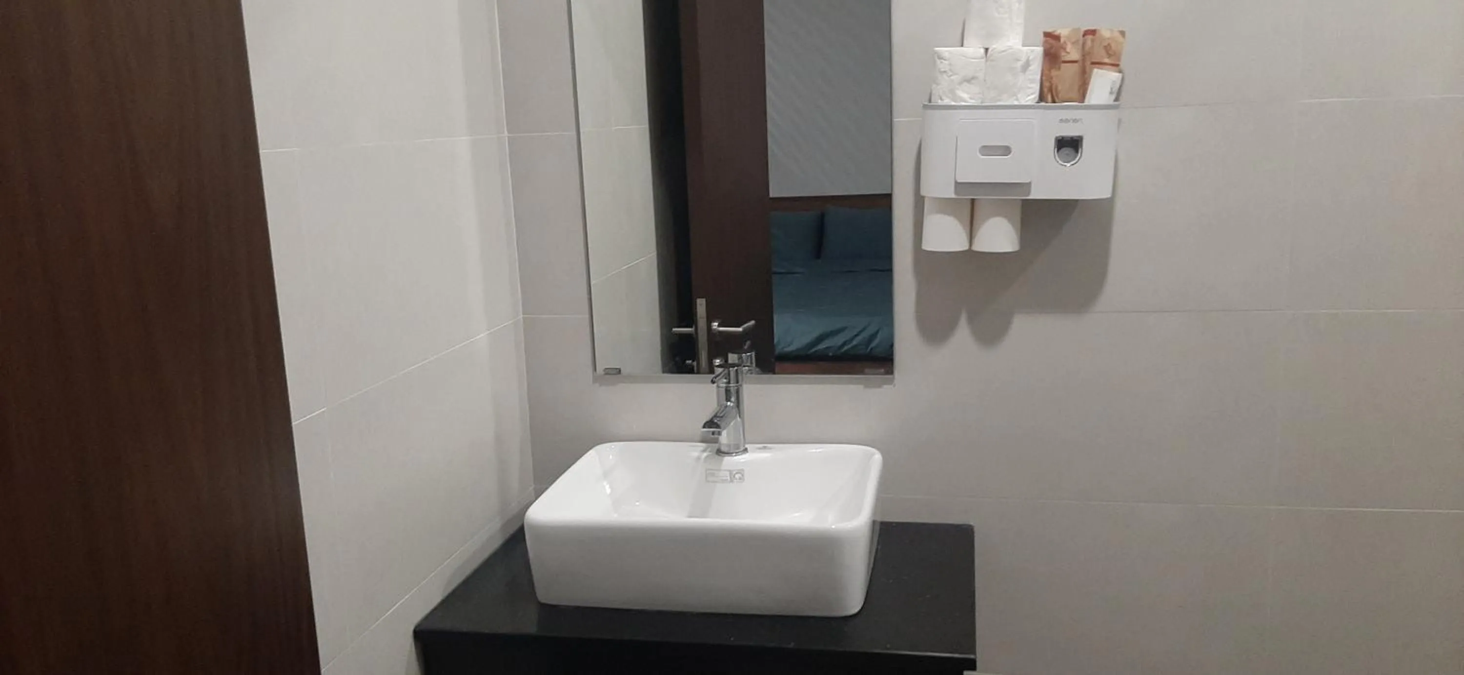 Bathroom in OYO 1161 Puchin Hotel And Apartment