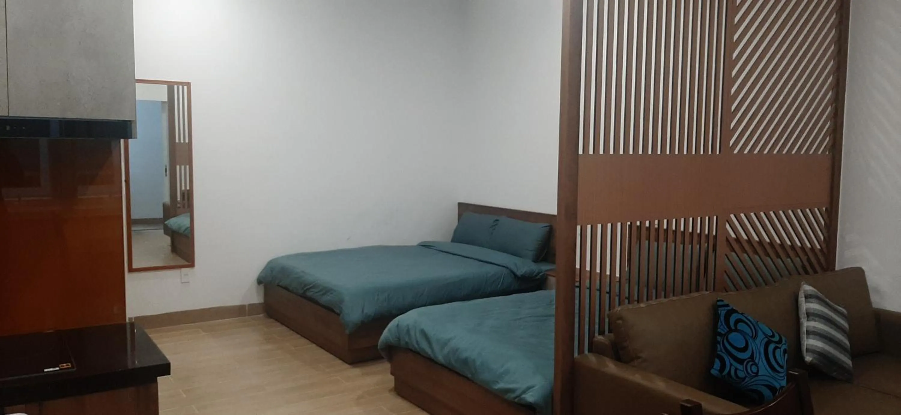 Bedroom, Bed in OYO 1161 Puchin Hotel And Apartment