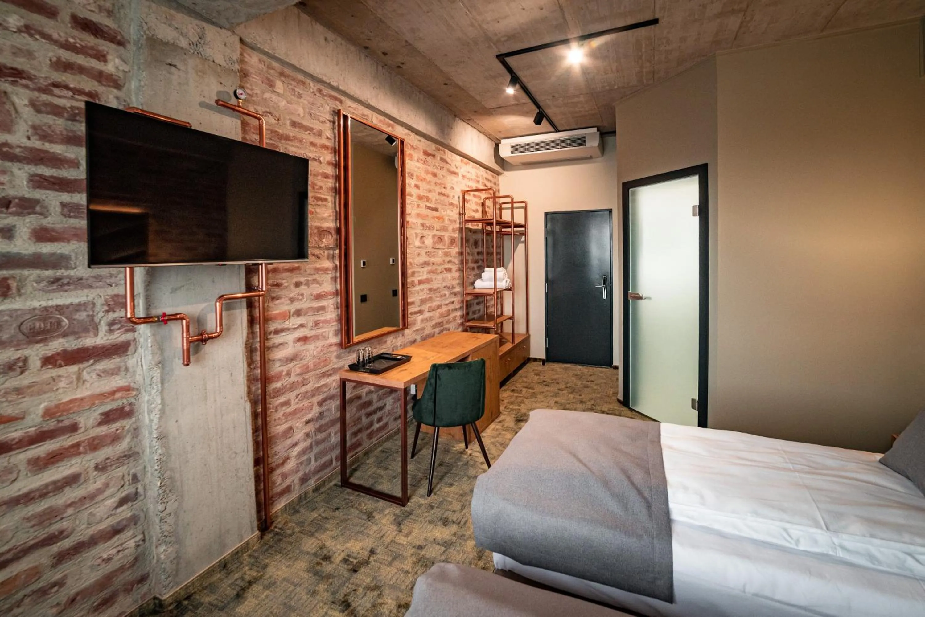 Bed in Mustang Boutique Rooms