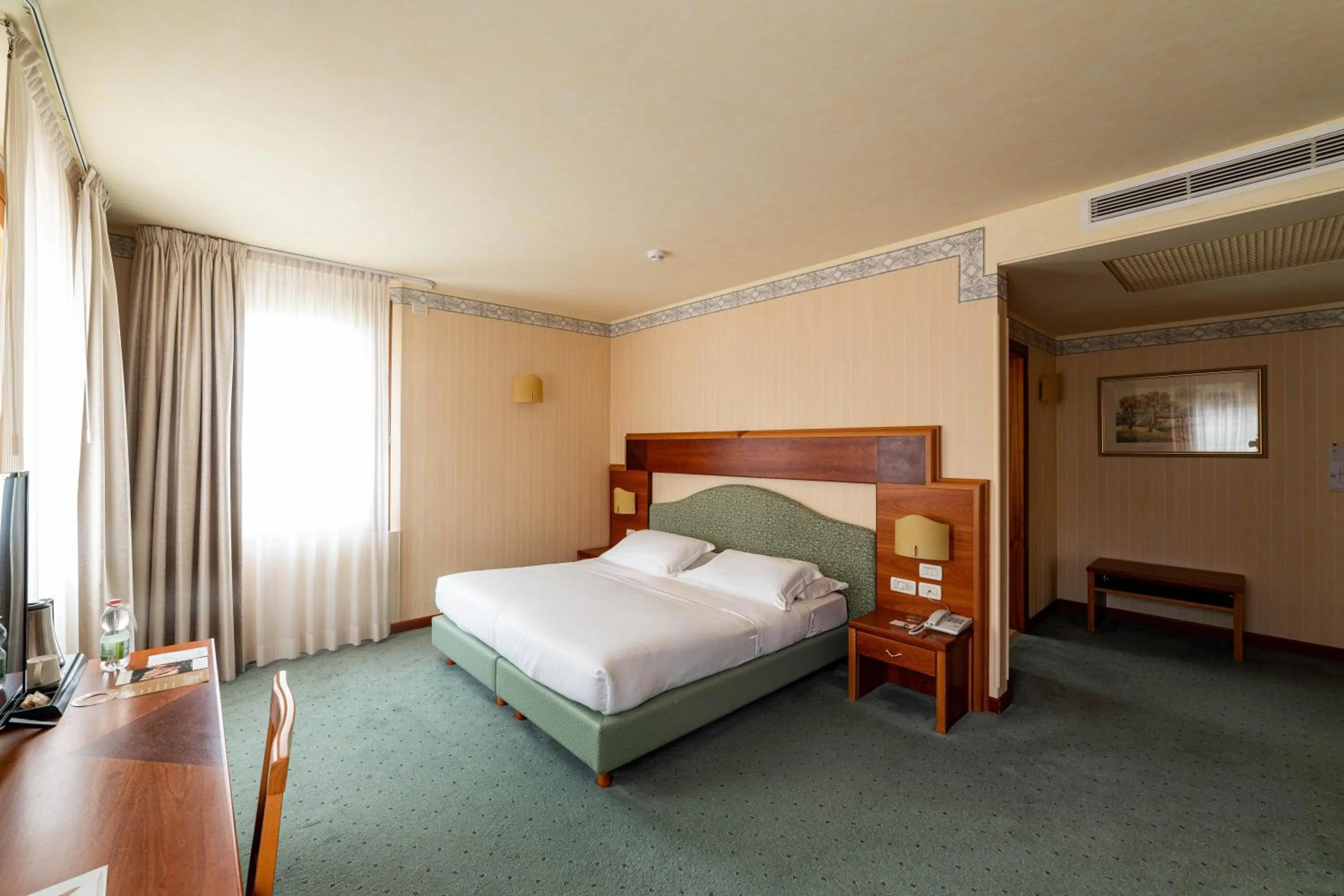 Bed in Phi Hotel Astoria