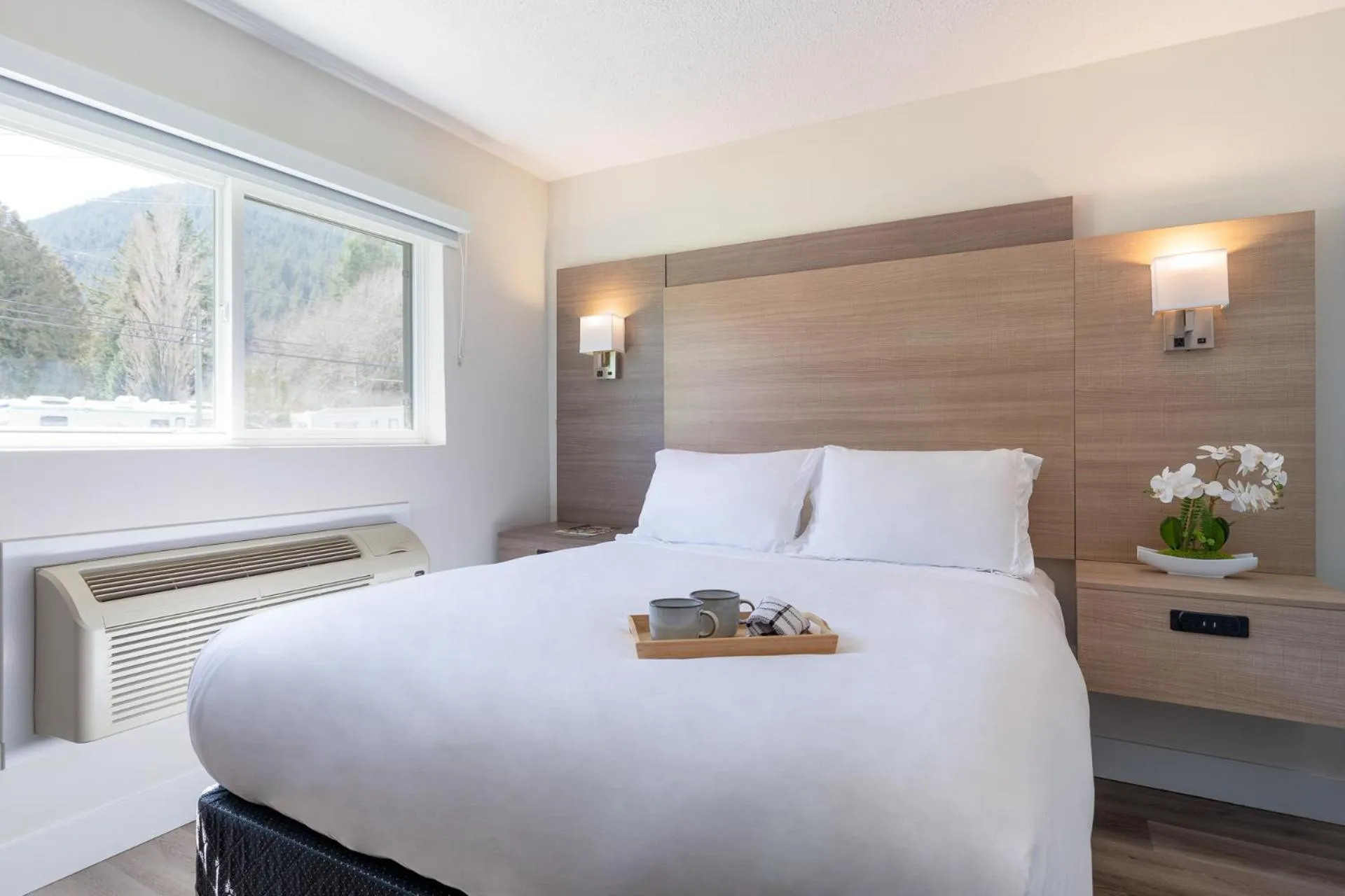 Bed in Harrison Grand Motel