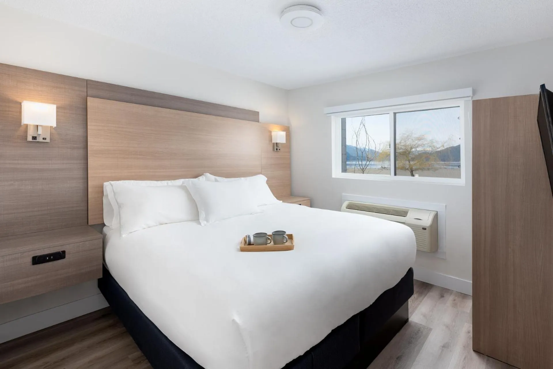 Bed in Harrison Grand Motel