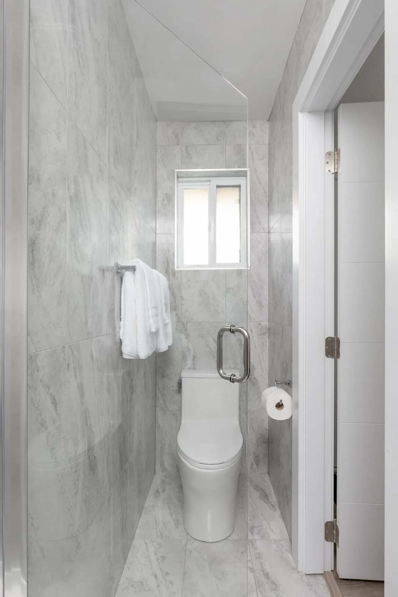 Toilet in Harrison Grand Motel