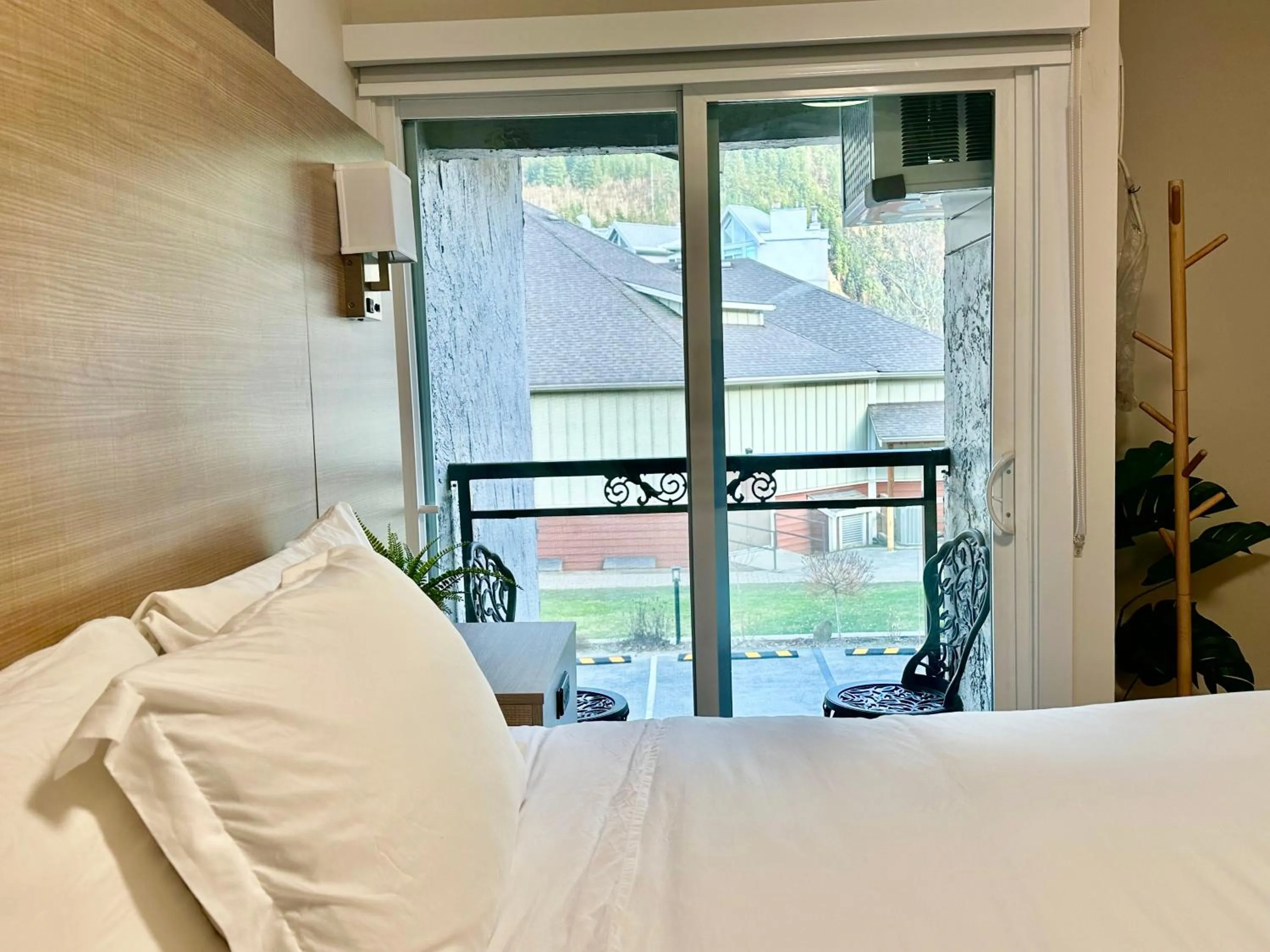 Bed in Harrison Grand Motel