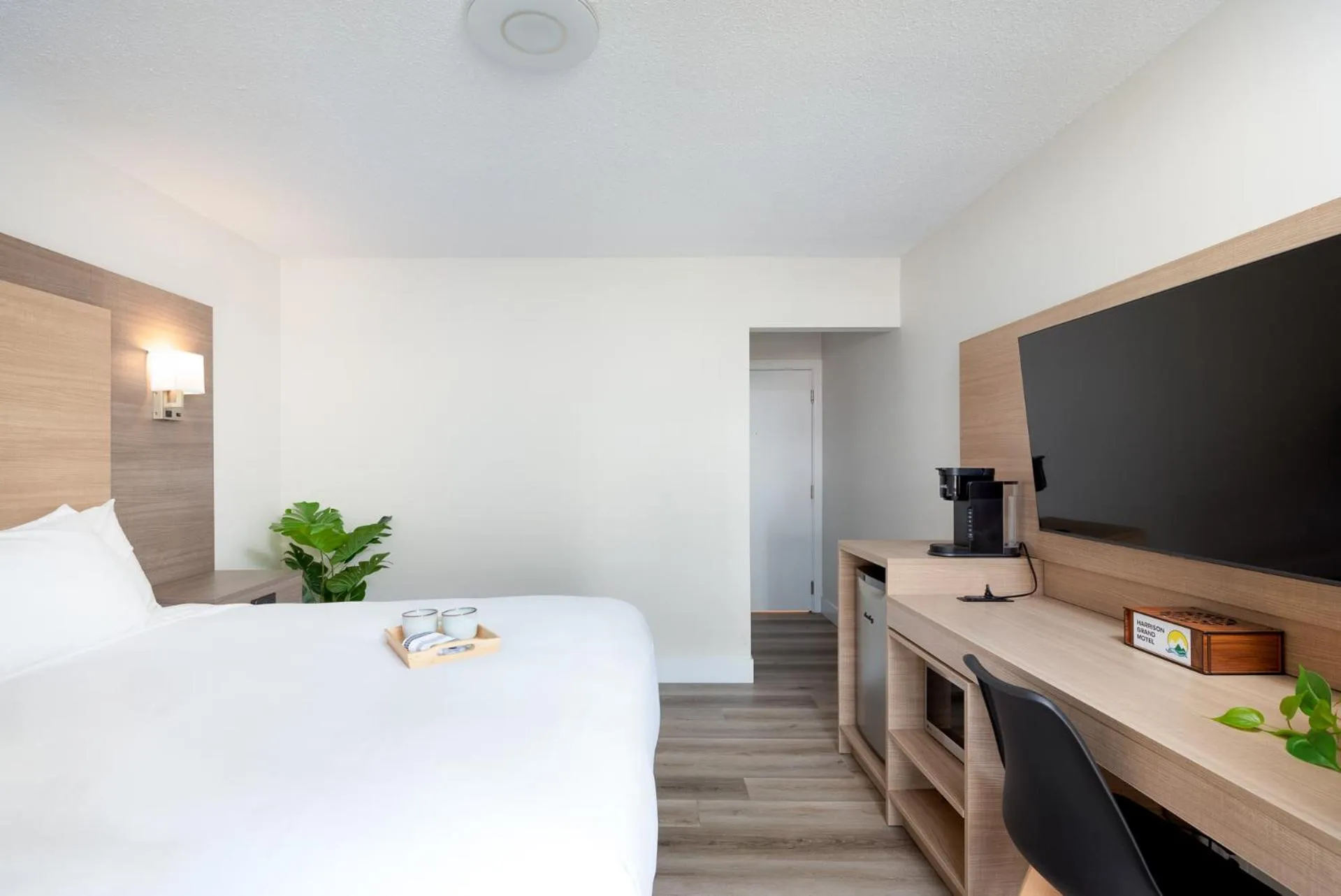 Bed in Harrison Grand Motel