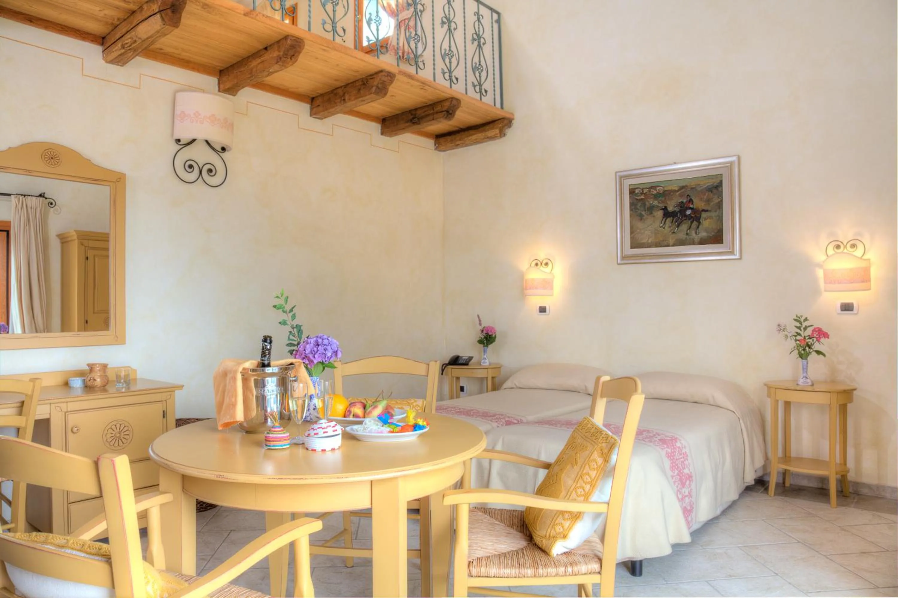 Living room, Bed in Hotel Sa Muvara