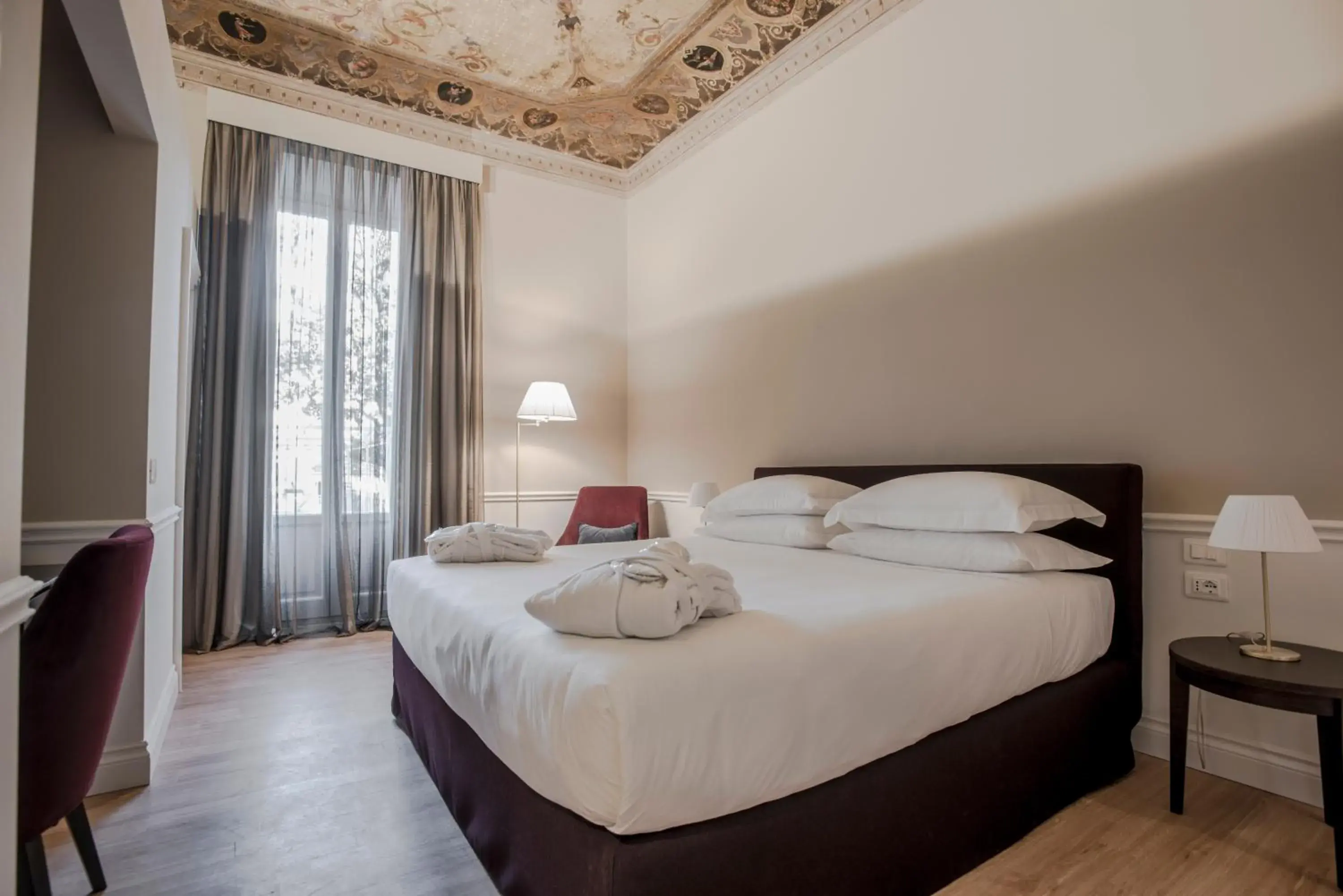 Bed in Palazzo Castri 1874 Spa & Garden Bed in Palazzo Castri 1874 Spa & Garden