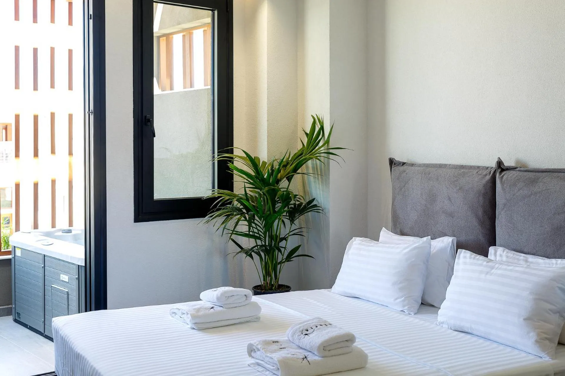 Bed in Utopia Luxury Suites