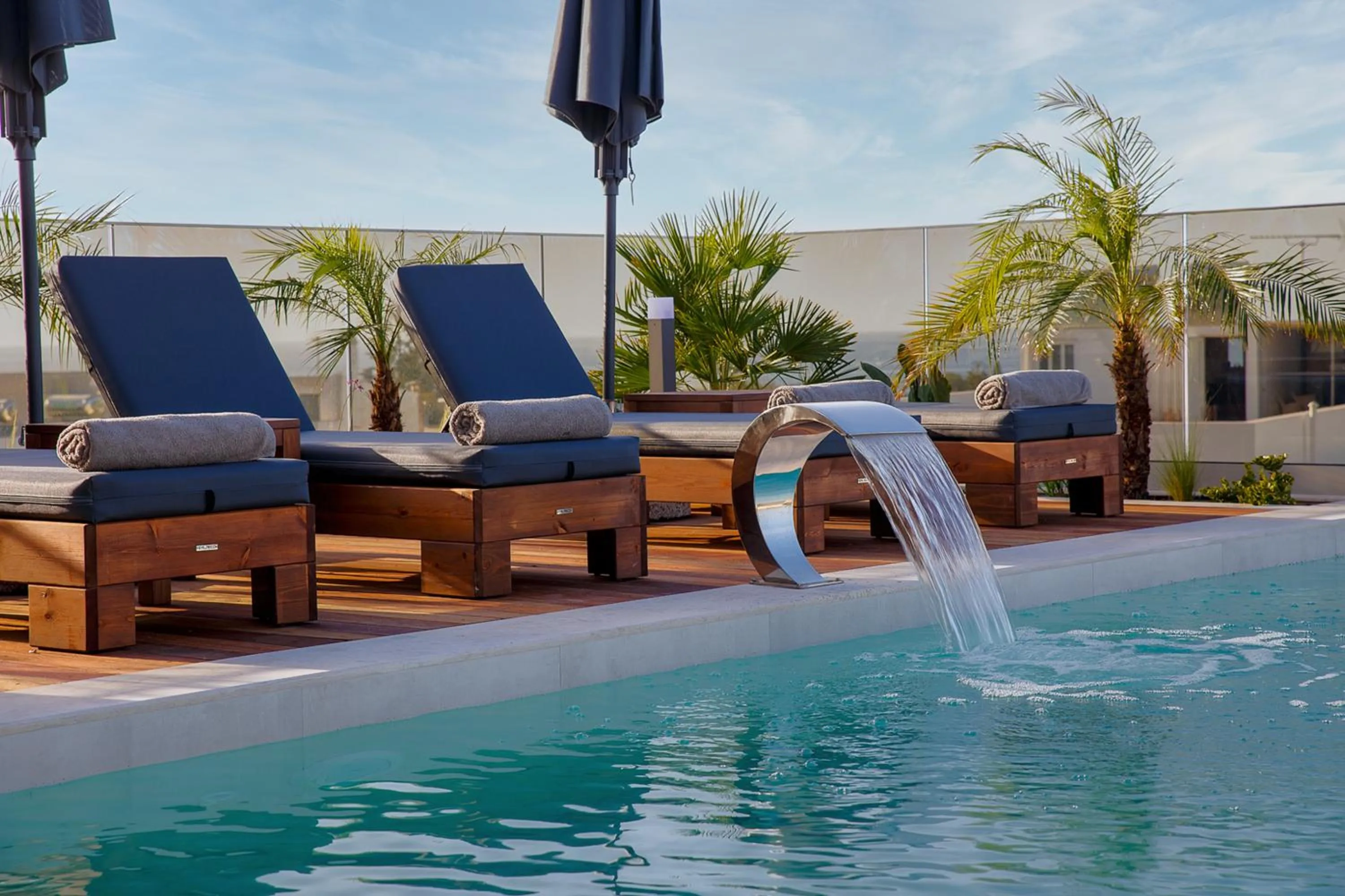 Swimming pool in Utopia Luxury Suites