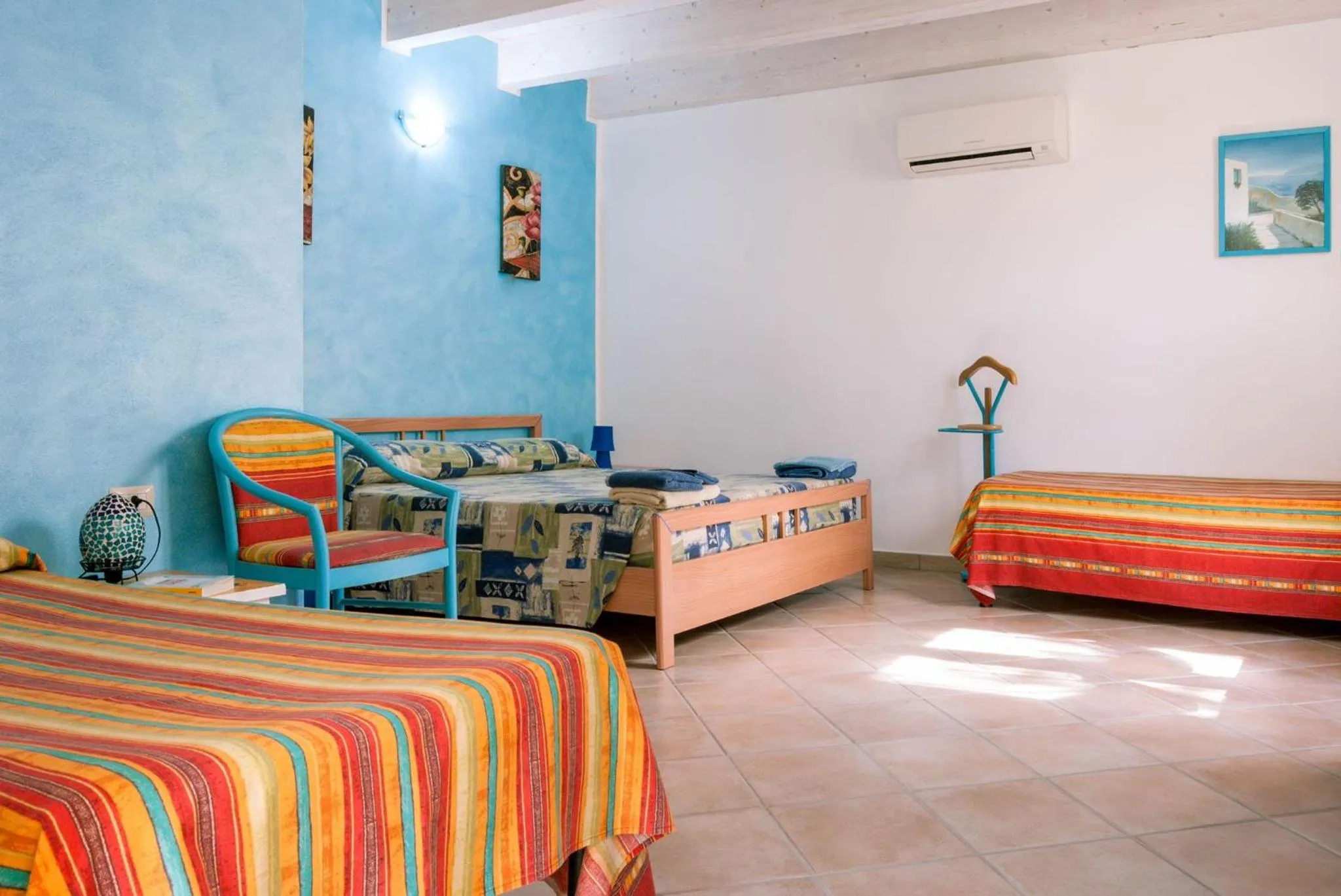 Bedroom in AFFITTACAMERE L'ARCOBALENO