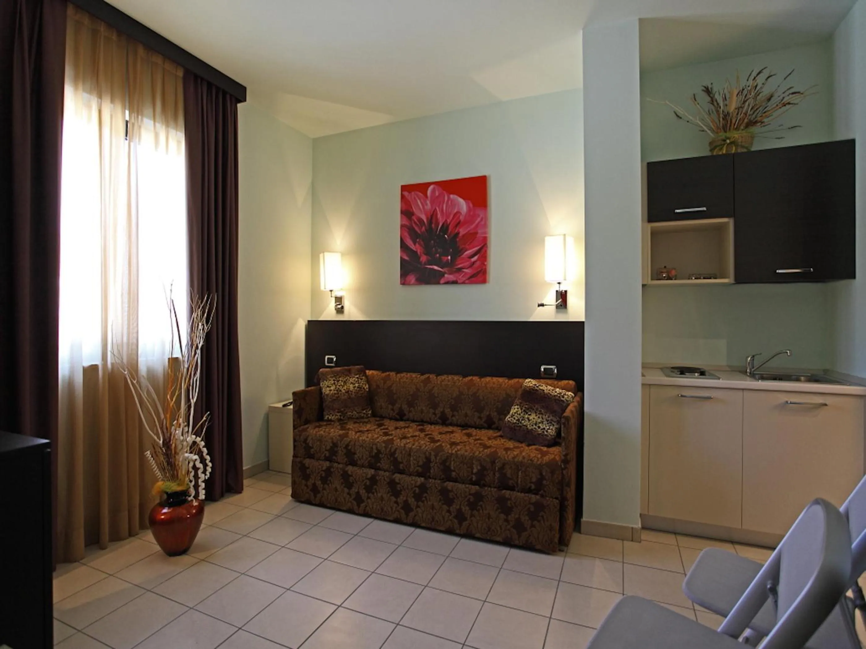 Kitchen or kitchenette in Euro Hotel