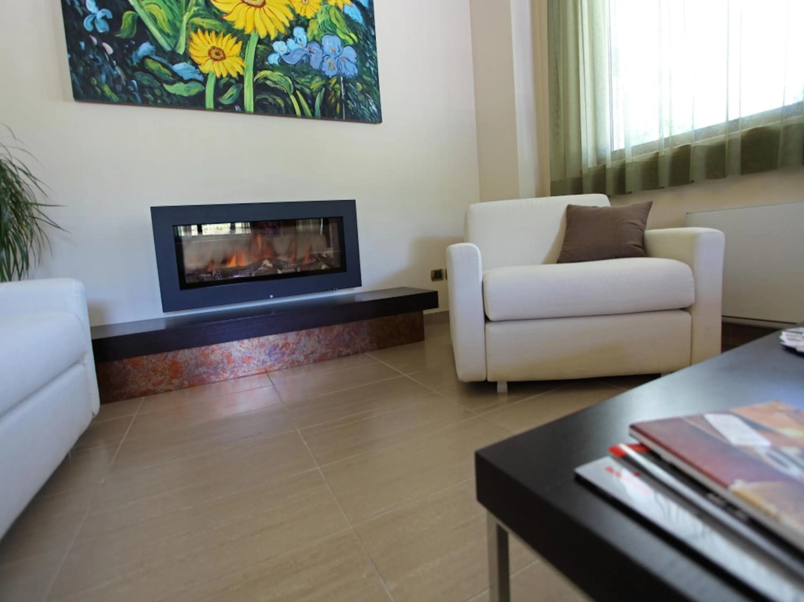 Communal lounge/ TV room in Euro Hotel