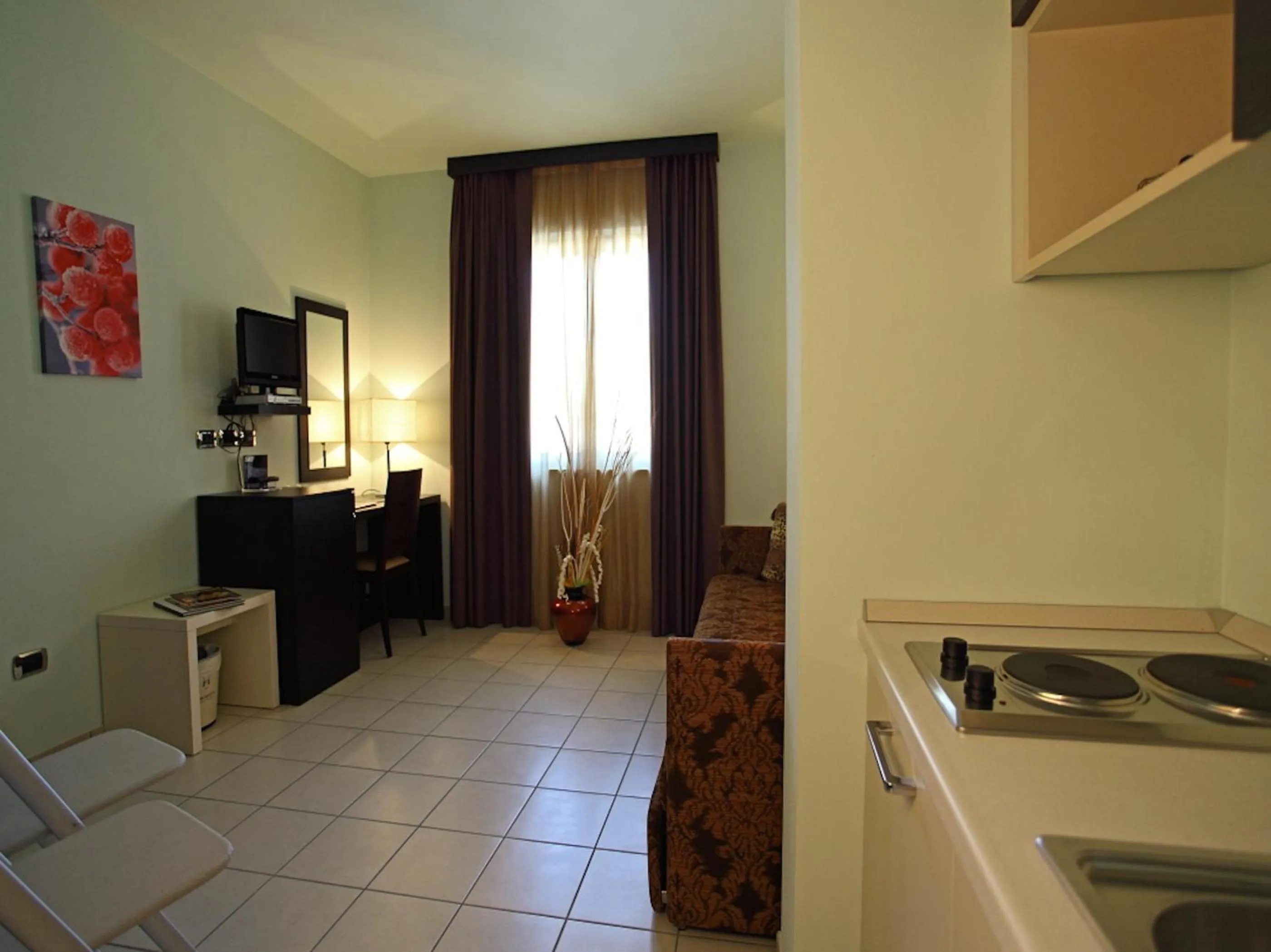 Kitchen or kitchenette in Euro Hotel
