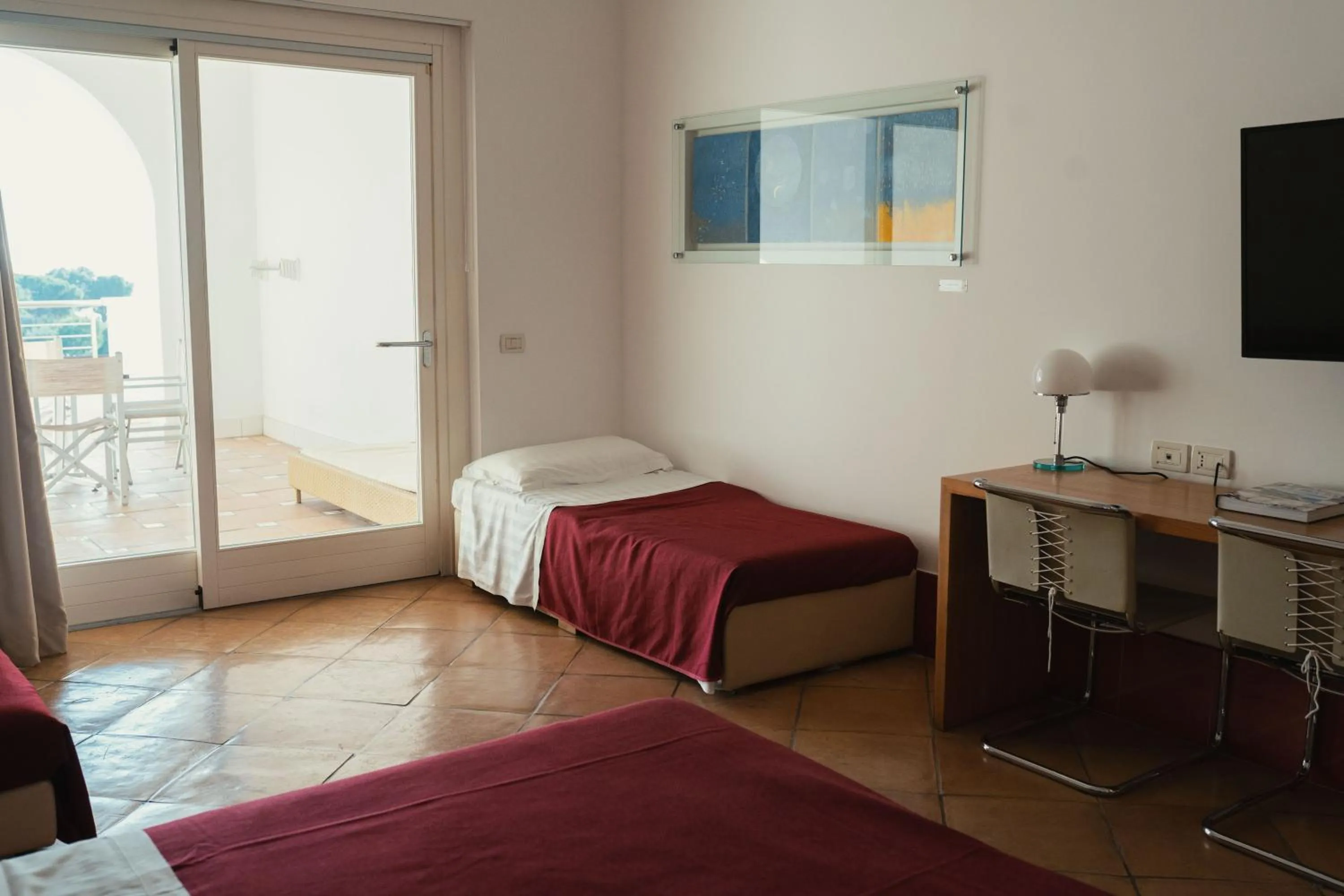Bedroom, TV/Entertainment Center in Hotel Grotta Di Tiberio