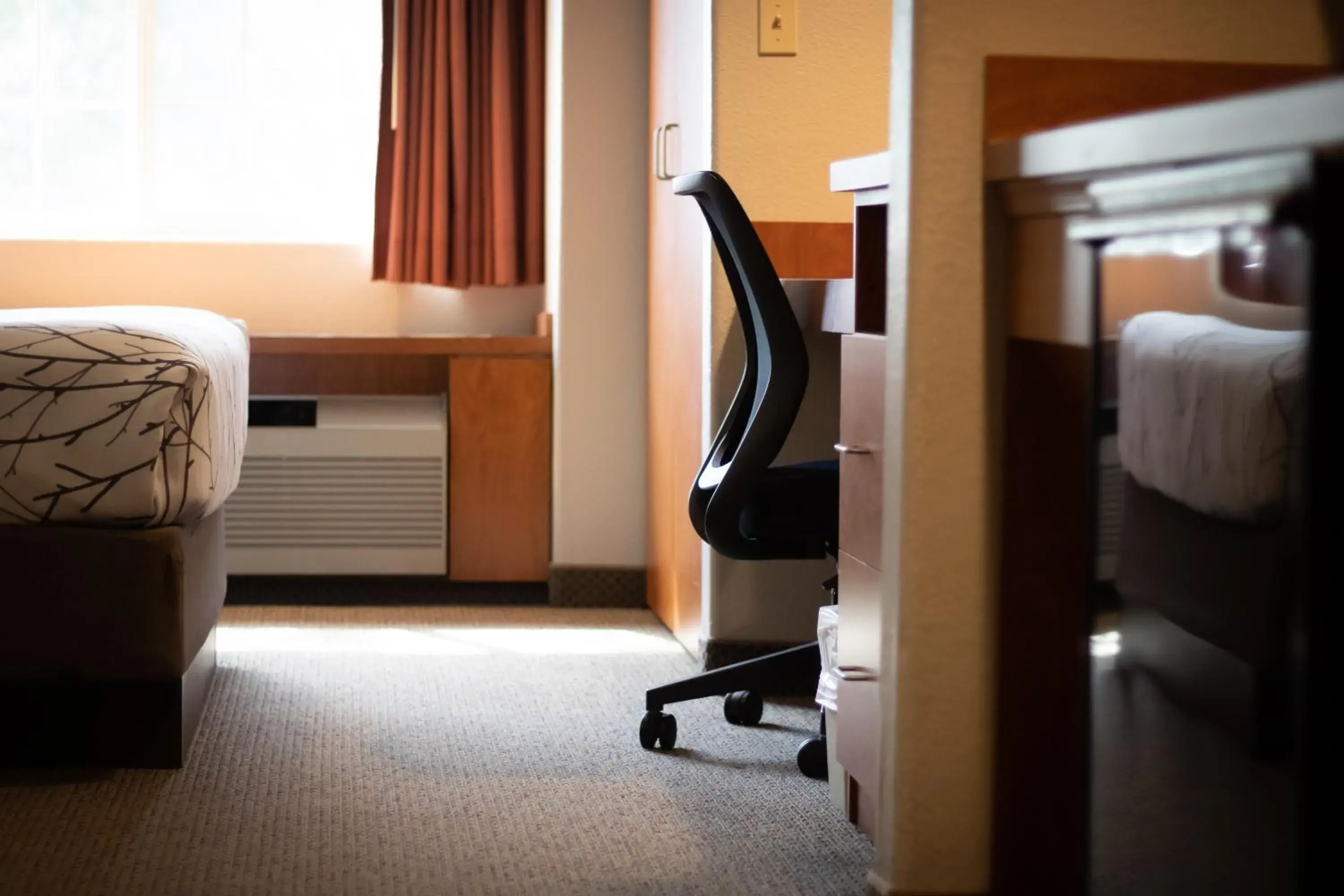 Queen Room in Monument Inn & Suites Queen Room in Monument Inn & Suites