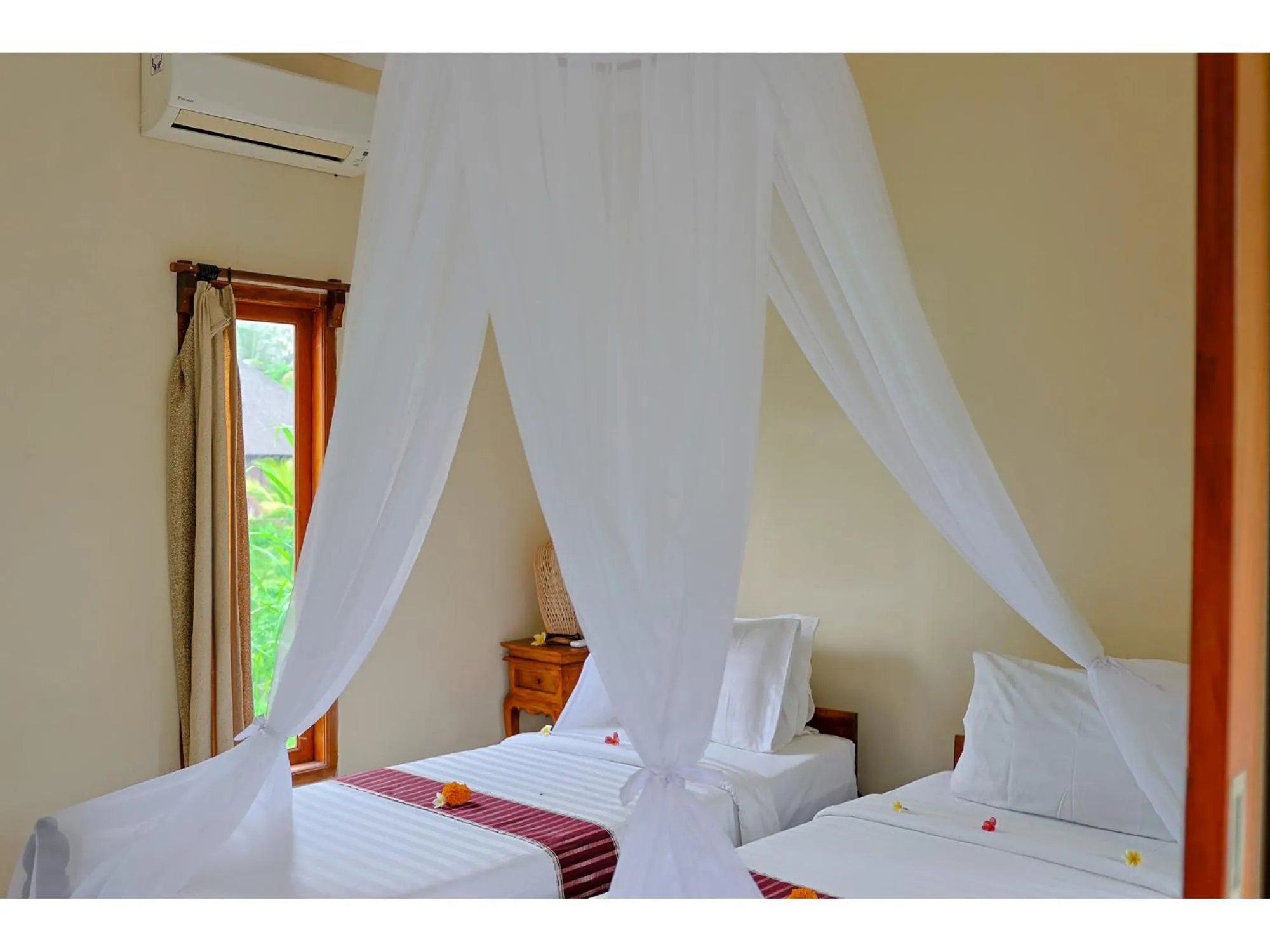 Bed in Gongwi Cottages Sidemen