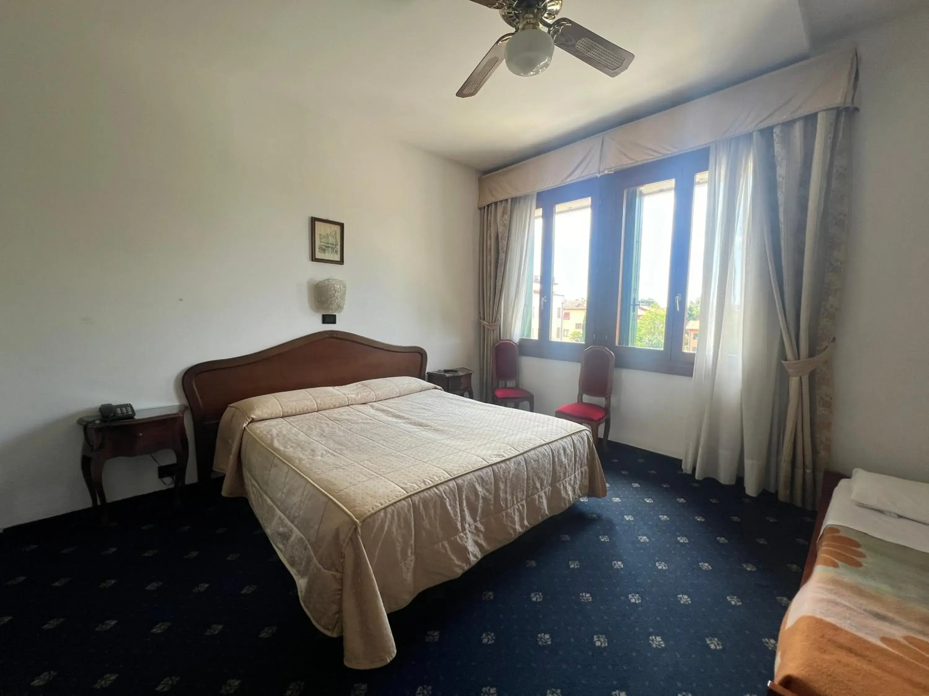 Comfort Triple Room in Hotel Cristallo Comfort Triple Room in Hotel Cristallo