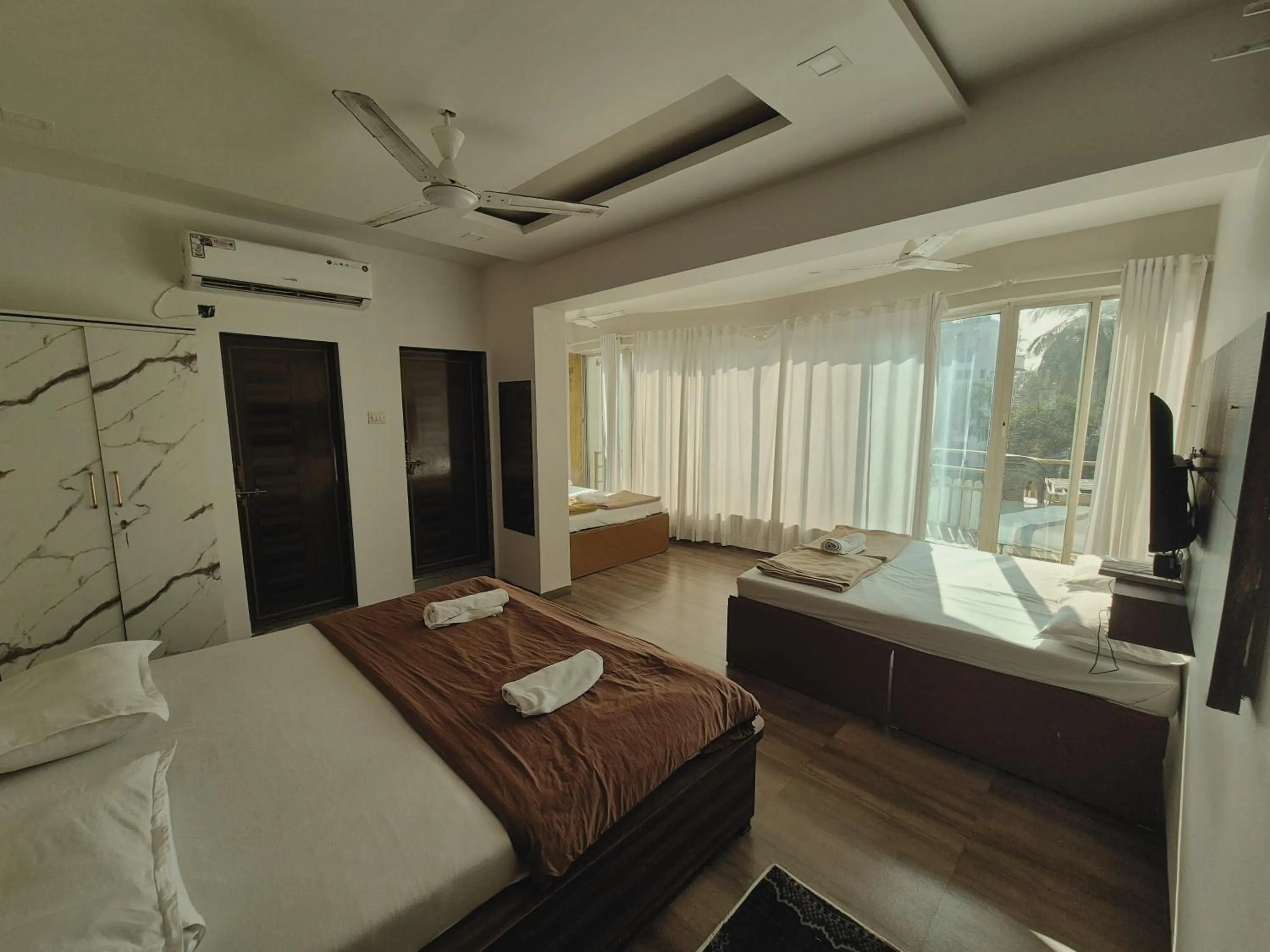View (from property/room), Bed in White House Beach Resort, Nagaon