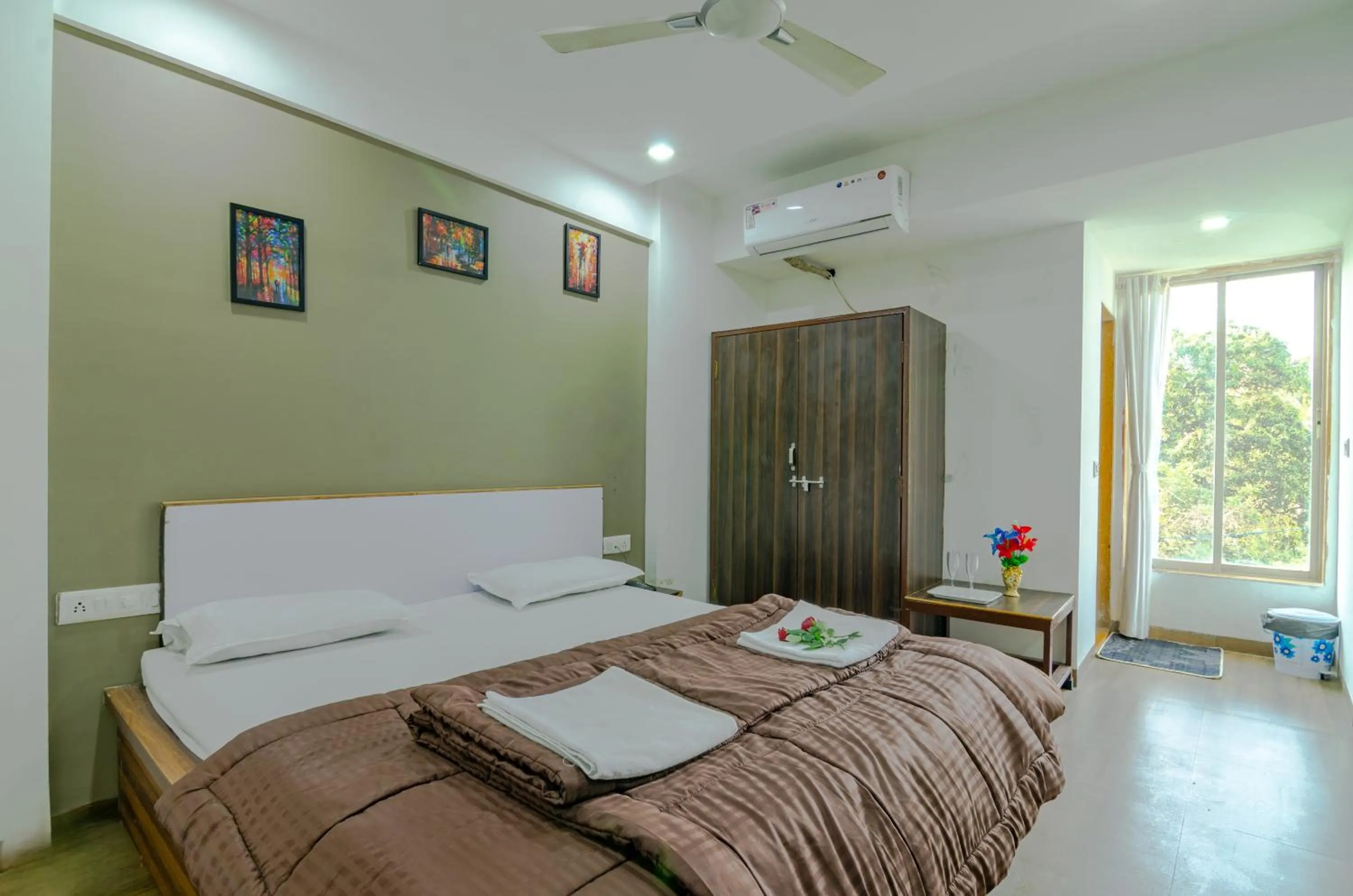 Photo of the whole room, Bed in White House Beach Resort, Nagaon
